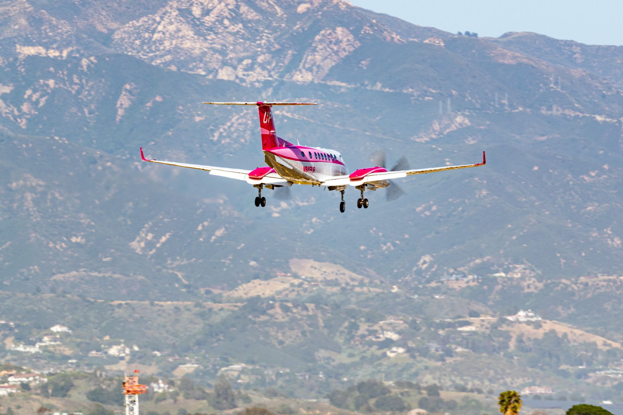 A Beechcraft King Air 350 about to land.