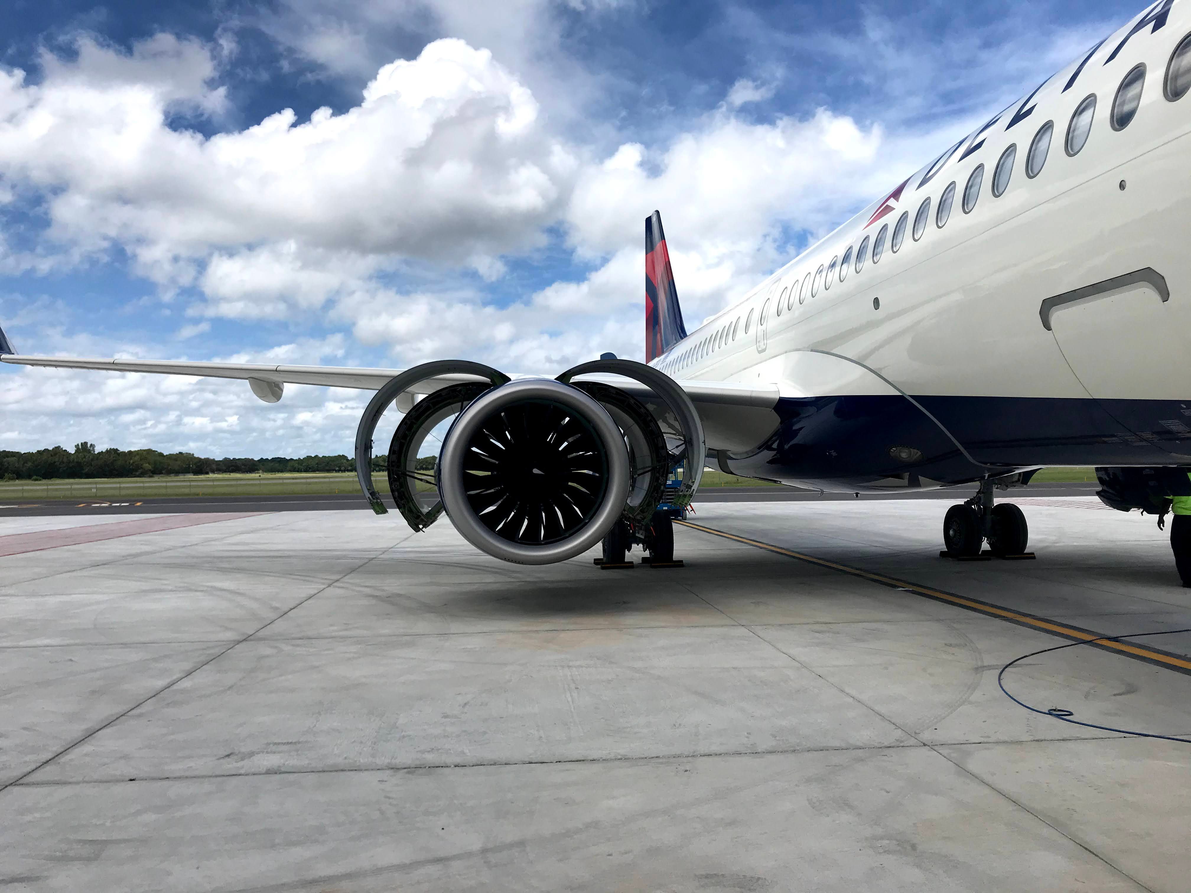 A Delta Airbus A220-300 on the ground.