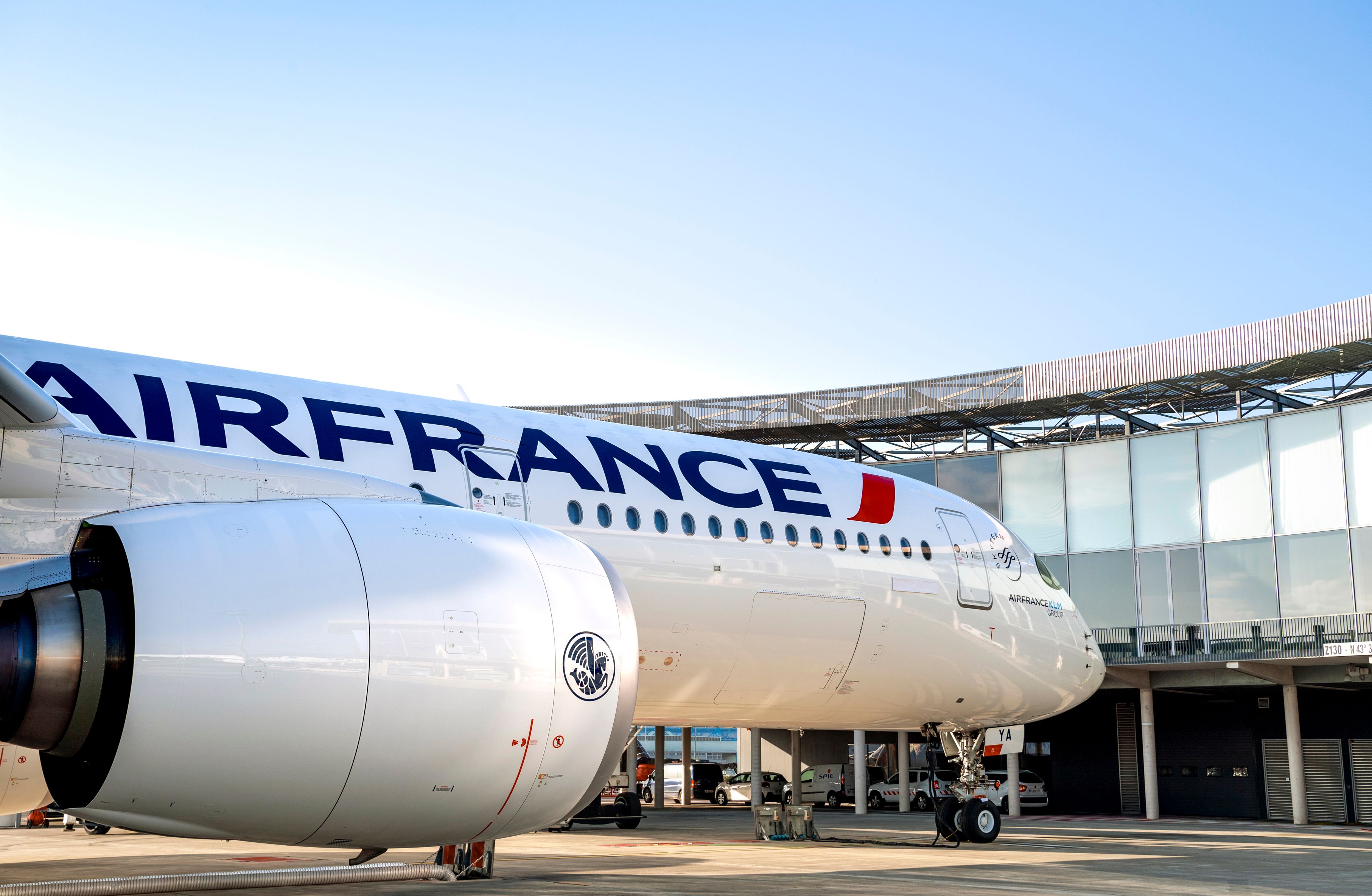 An Air France Airbus A350 parked at an airport gate.