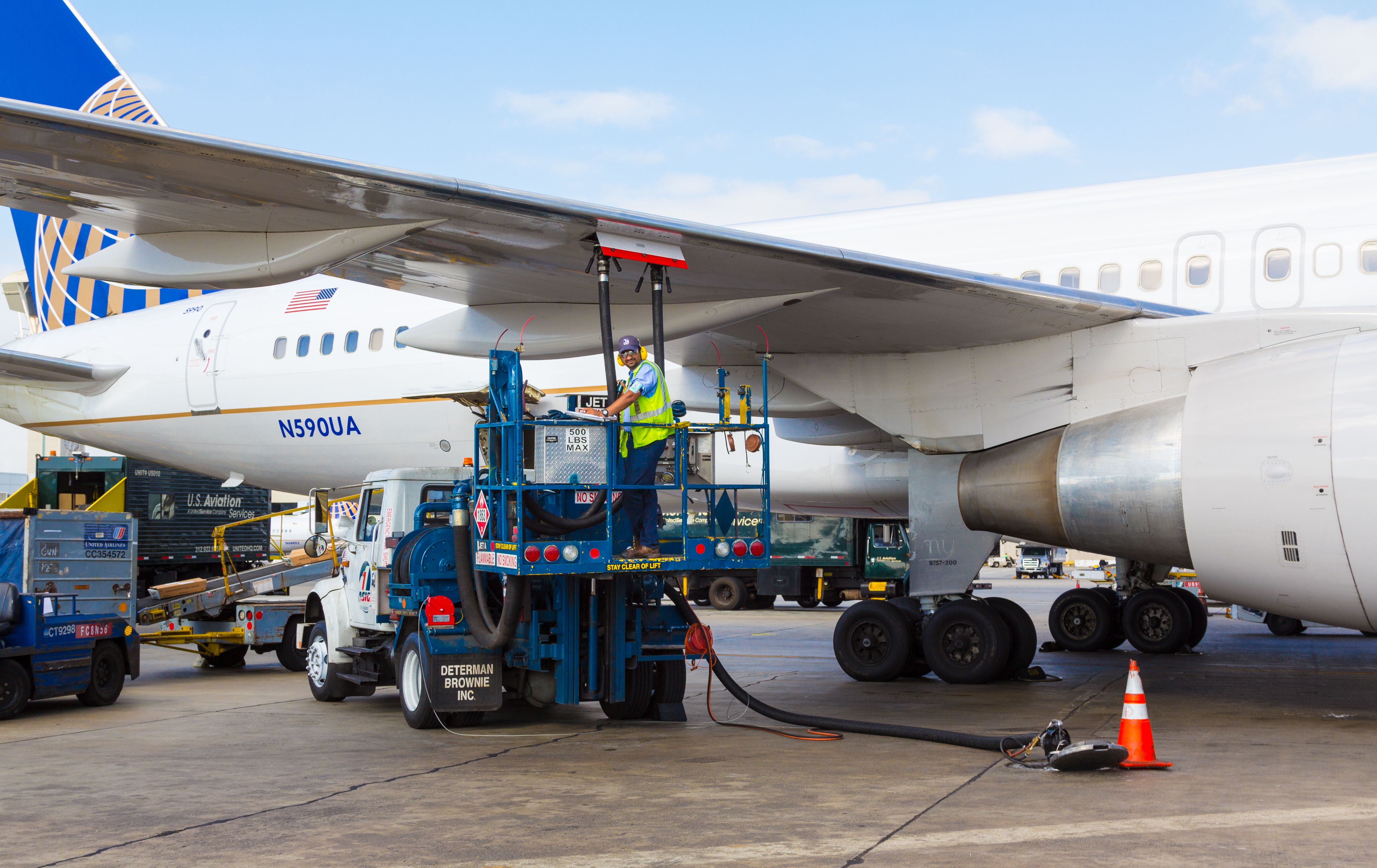 A United Airlines aircraft being fueled on an airport apron.