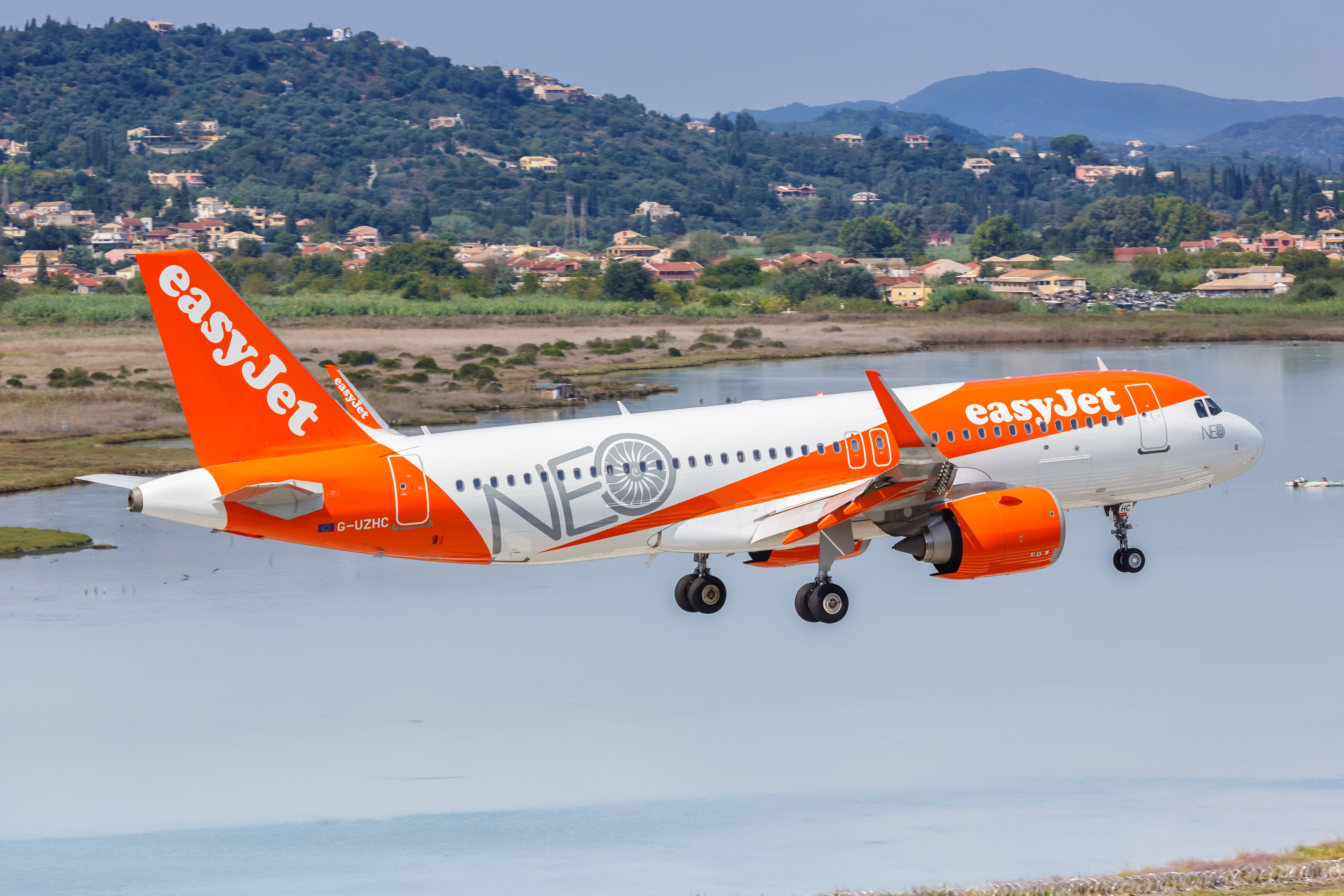 An easyJet Airbus A320neo aircraft taking off from Corfu Airport in Greece.