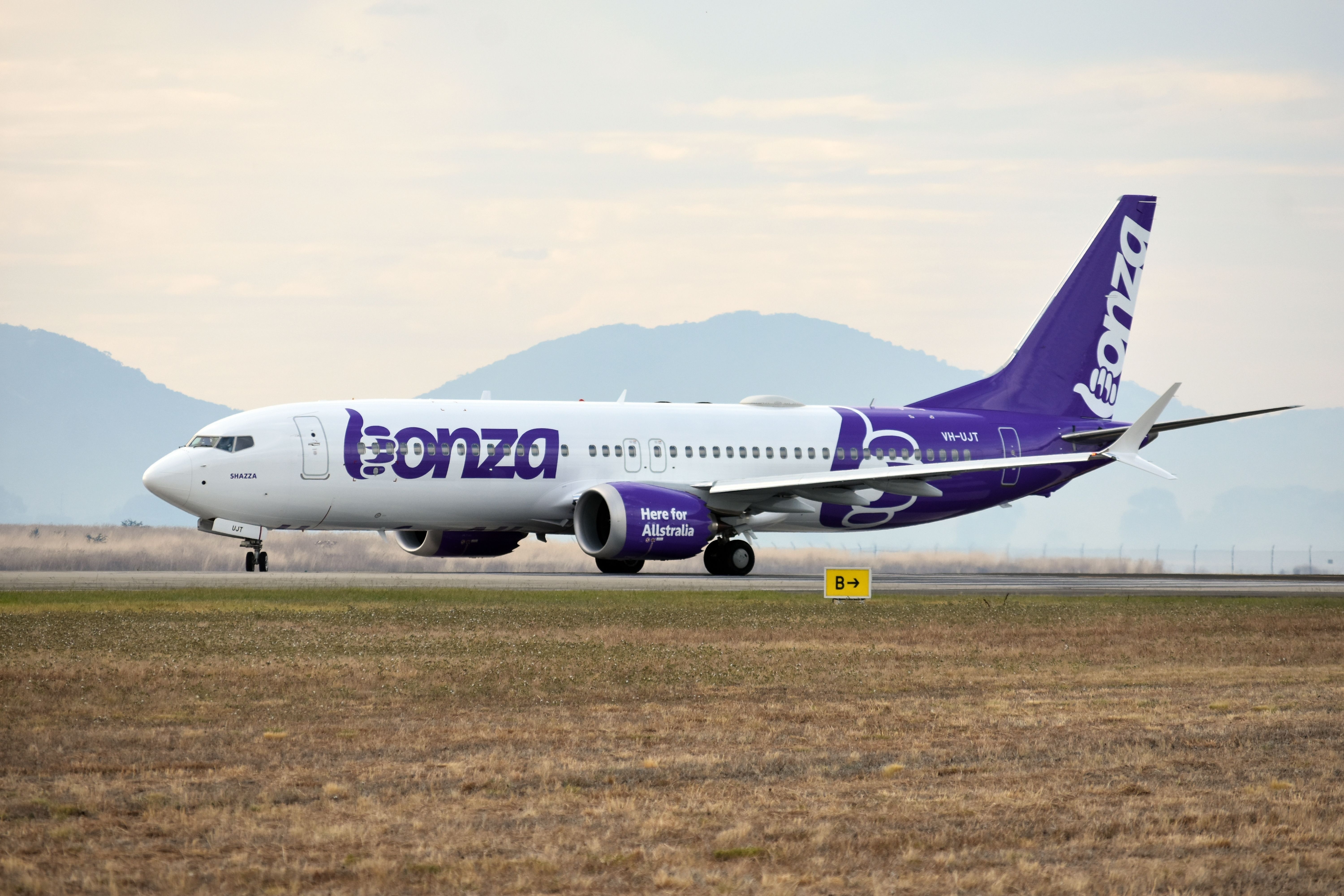A Bonza Boeing 737 MAX Aircraft taxiing to the runway.