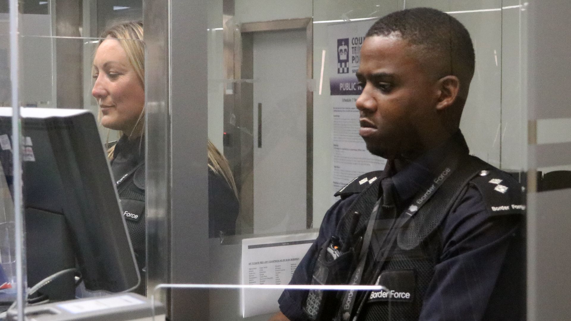 A UK passport control officer at Bristol Airport.