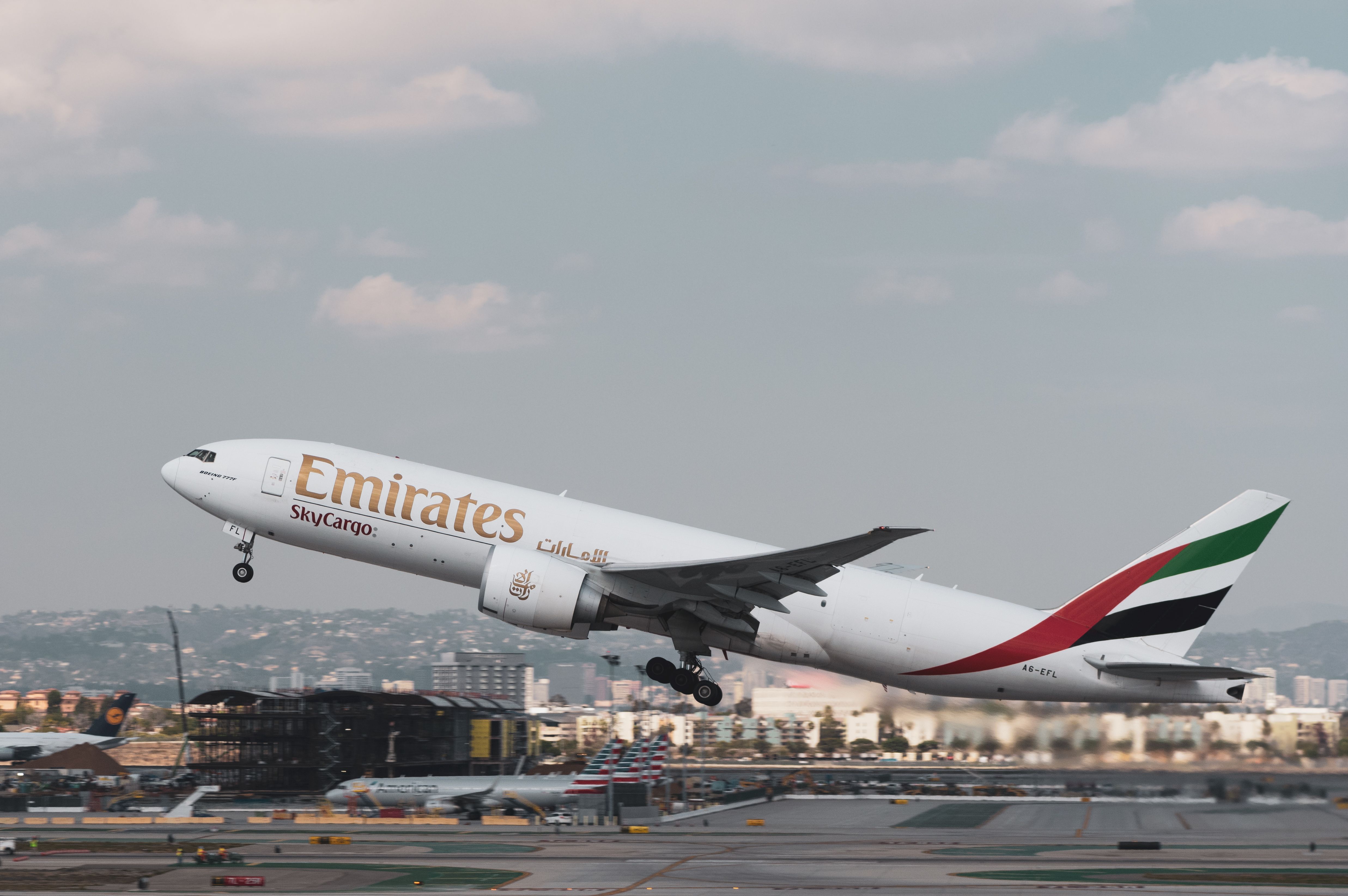 An Emirates SkyCargo 777F taking off.