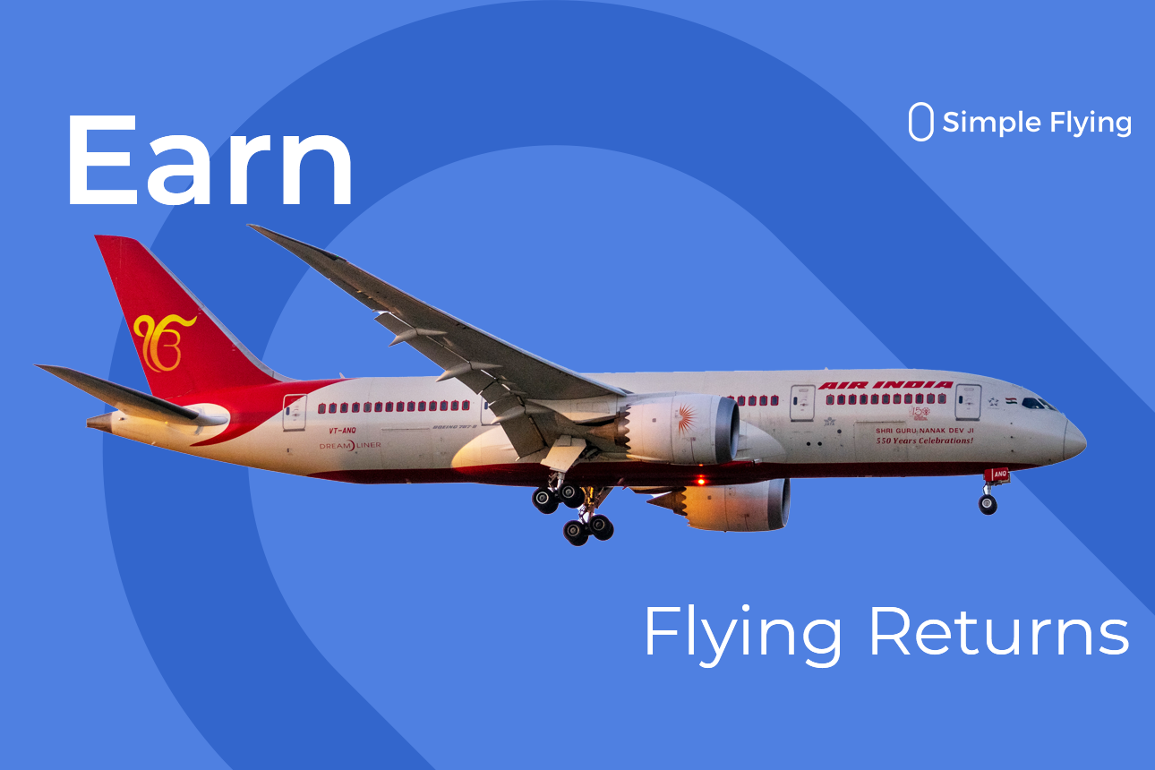 An Air India aircraft in between the words Earn and Flying Returns.