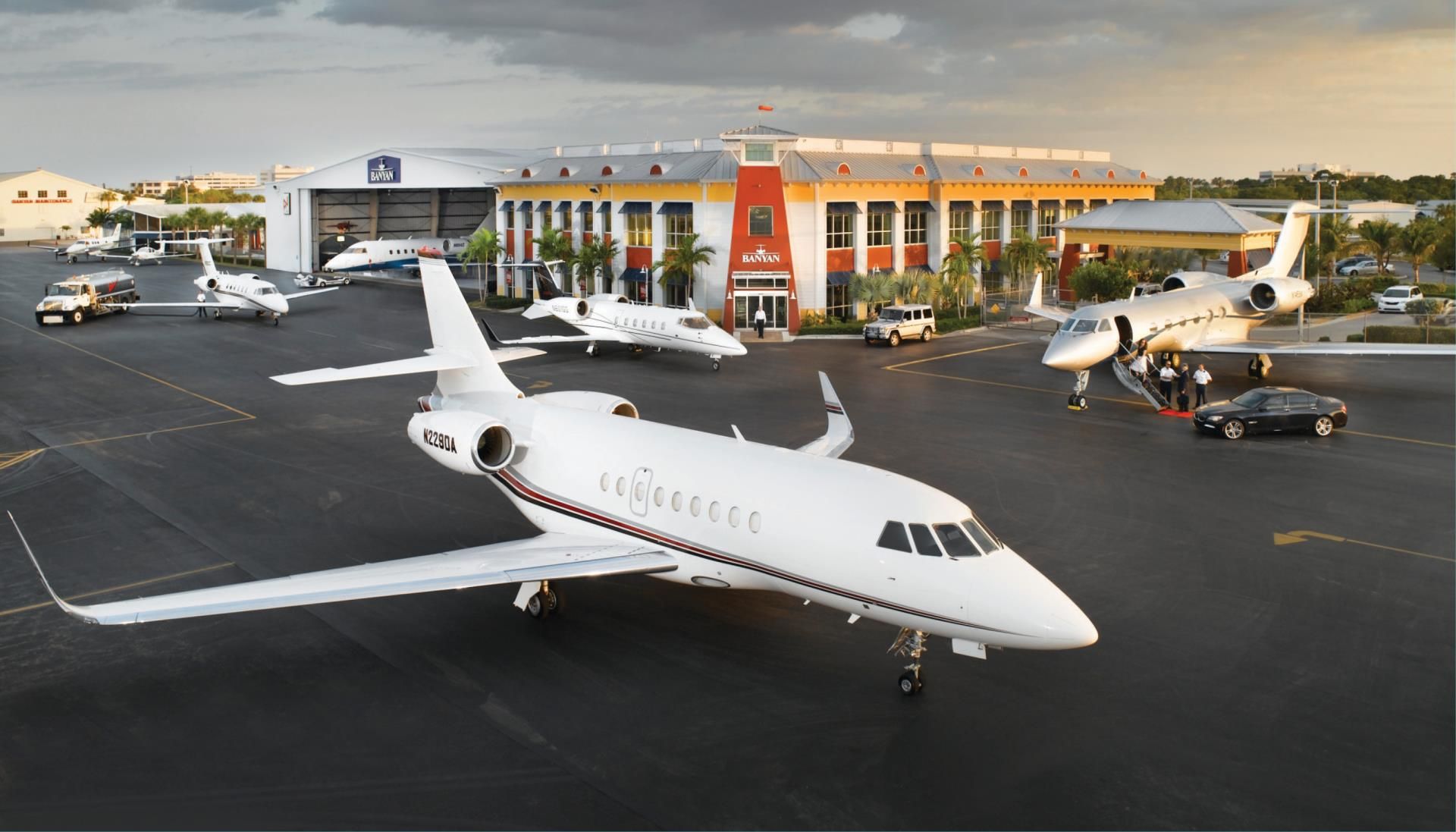 Many business jets parked and taxiing at Fort Lauderdale Executive Airport.