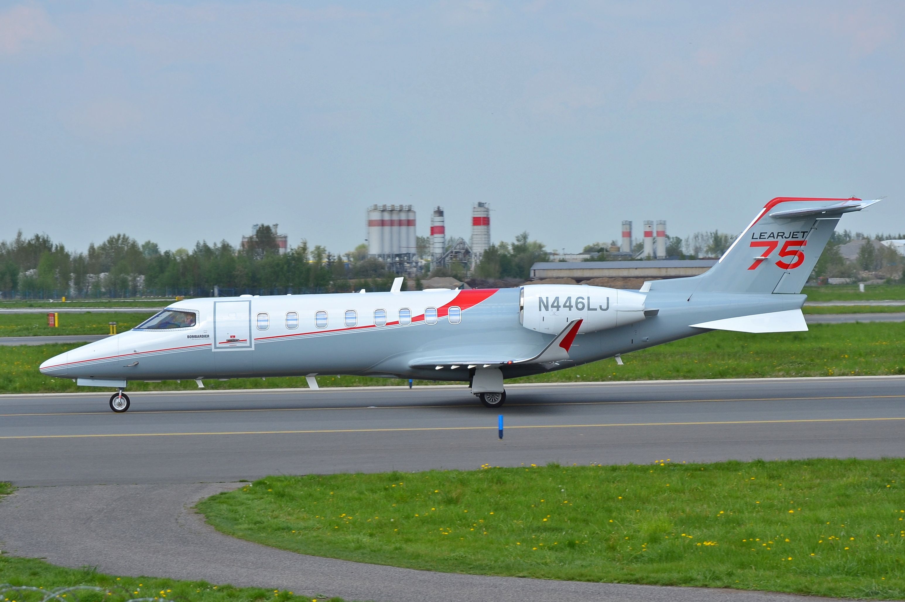 A Learjet 75 taxiing to the runway.