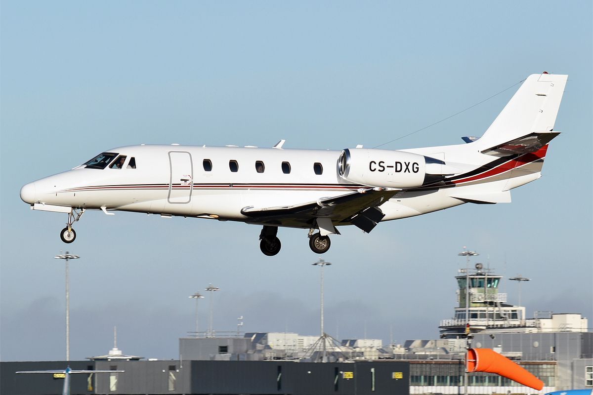 A Cessna 560XL Citation XLS flying in the sky.