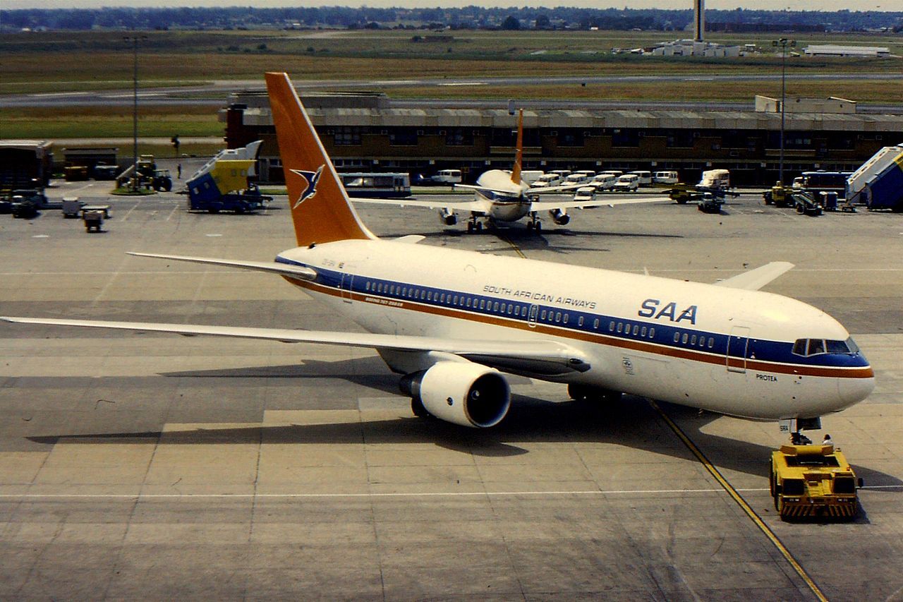 A South African Airways Boeing 767 being pushed back from the gate.