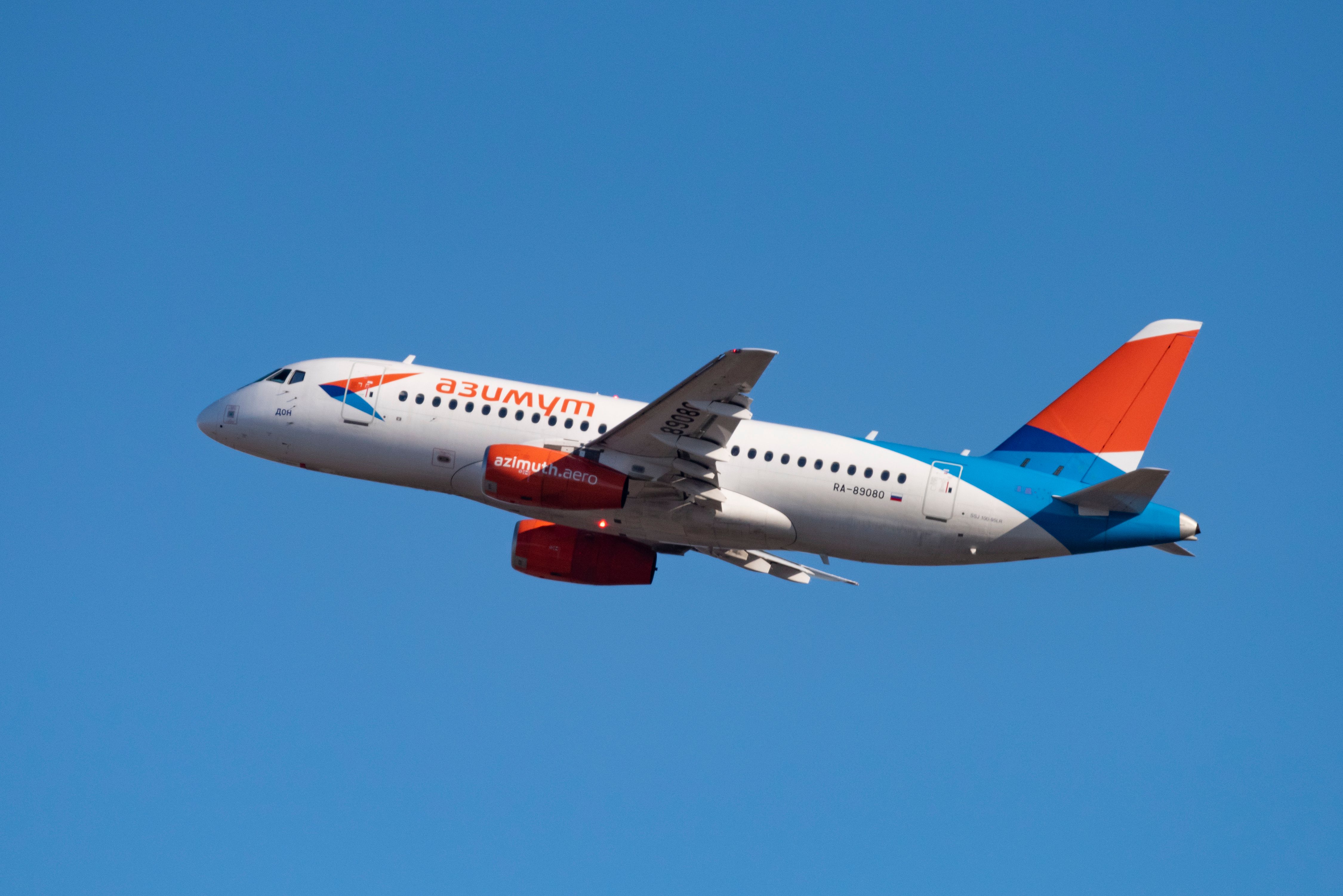 Novosibirsk, Russia - April 8, 2019: Sukhoi Superjet 100-95LR RA-89080 Azimuth Airlines in the sky after take off from the international airport Tolmachevo.