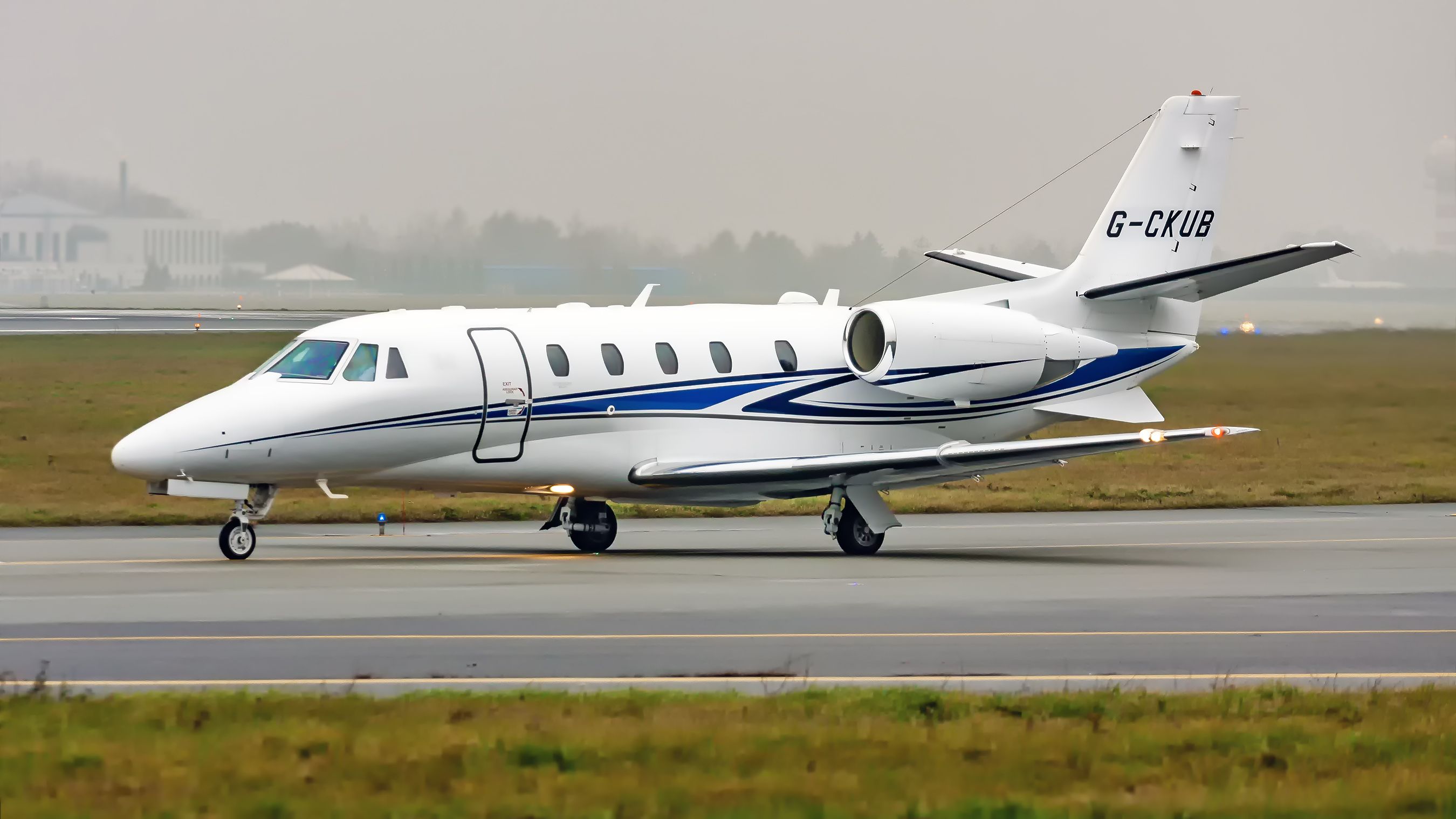 A Cessna Citation Excel taxiing to the runway.