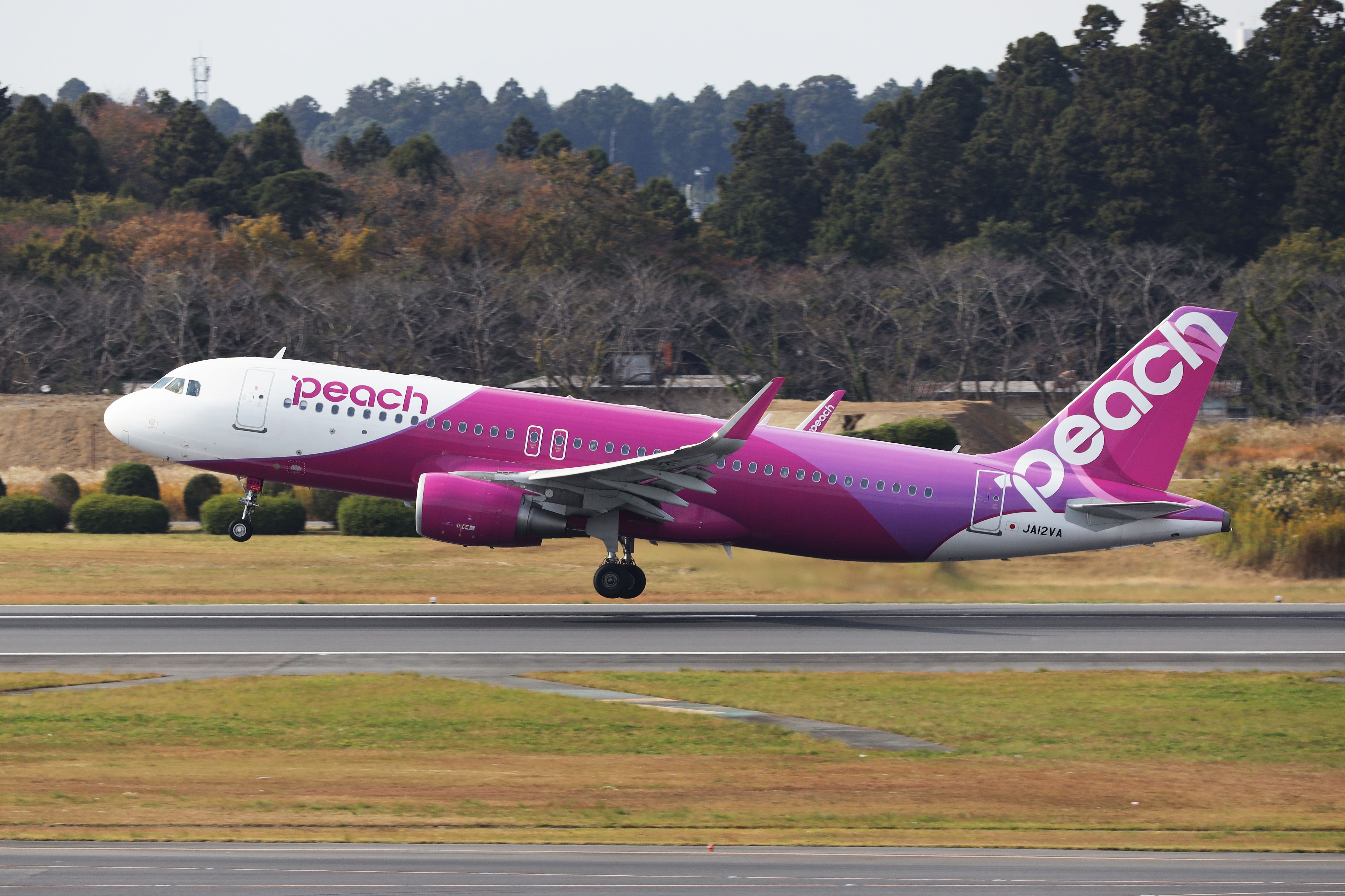 Peach Air Airbus A320-200 take off from Tokyo Narita International Airport