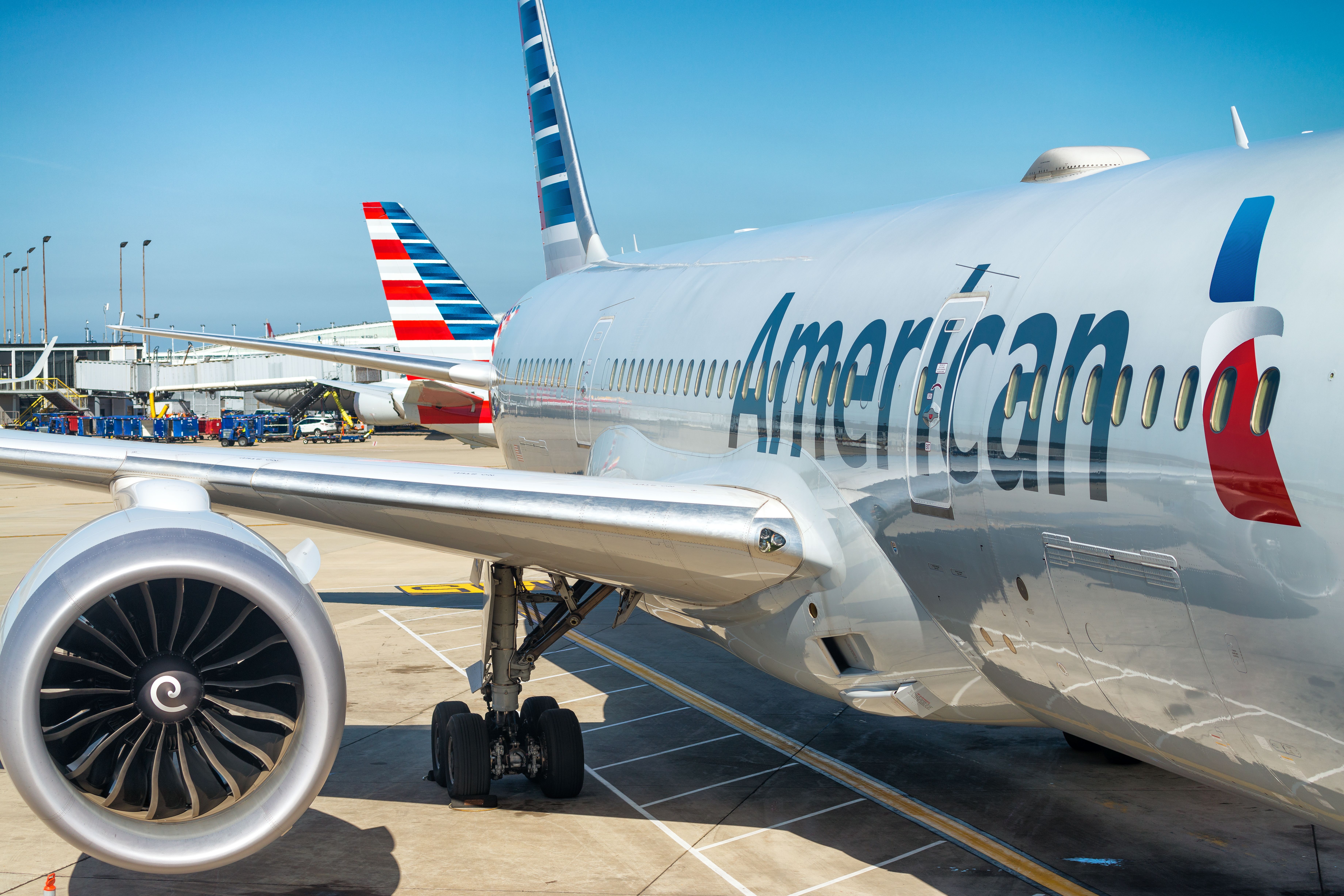 An American Airlines aircraft parked at the gate.