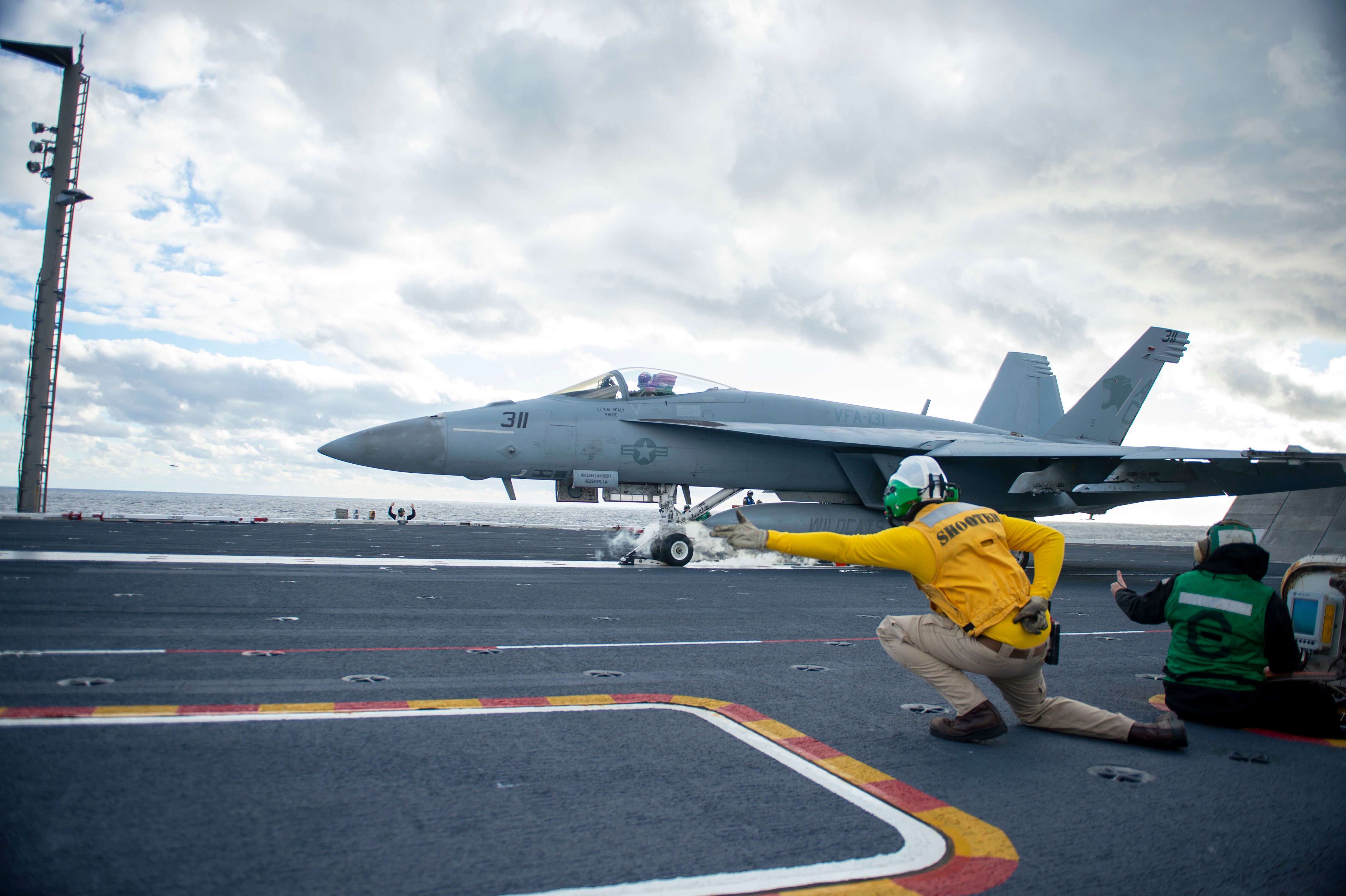  An F/A-18E Super Hornet about to launch from an aircraft carrier.