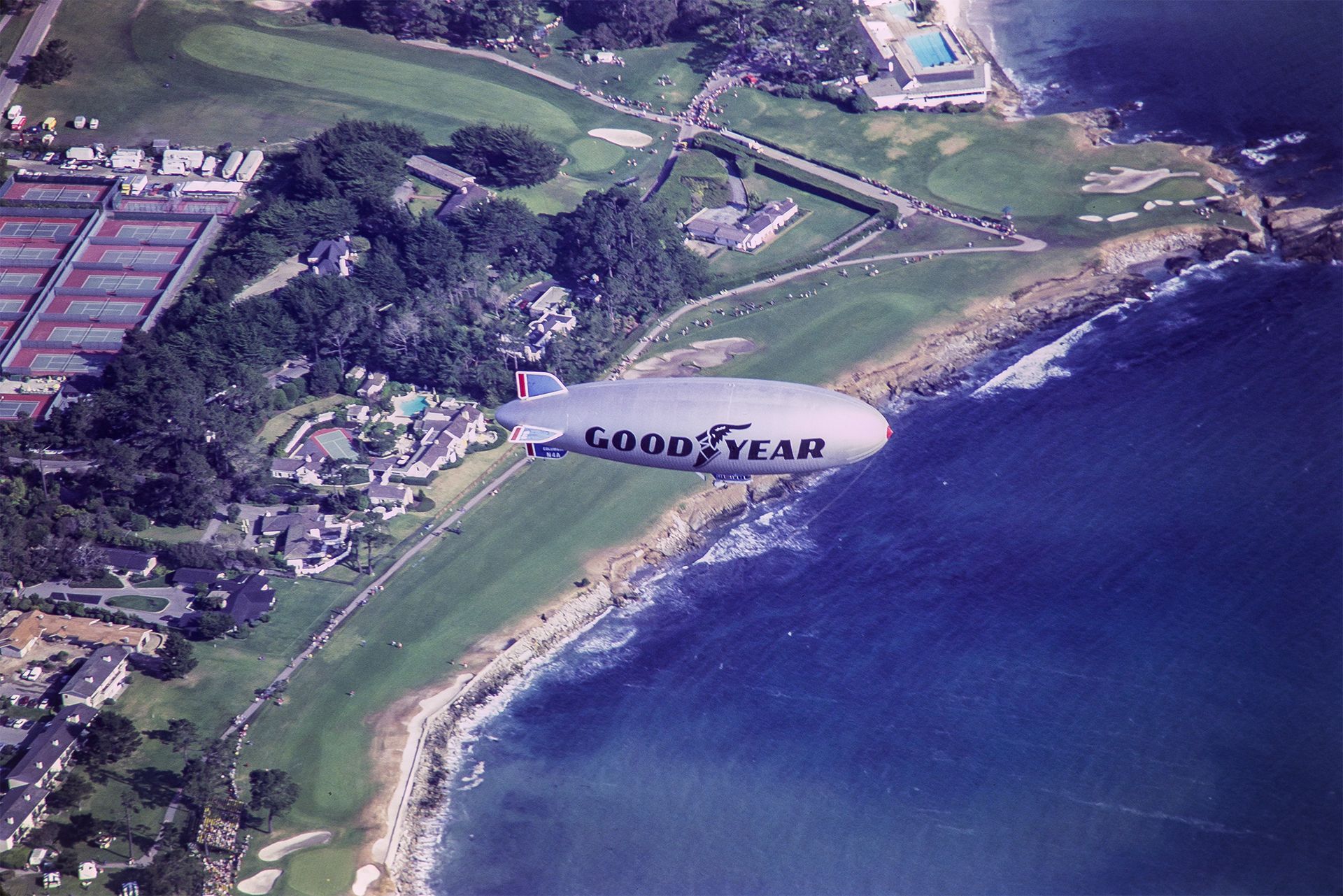 Goodyear blimp 1983 flying over Pebble Beach