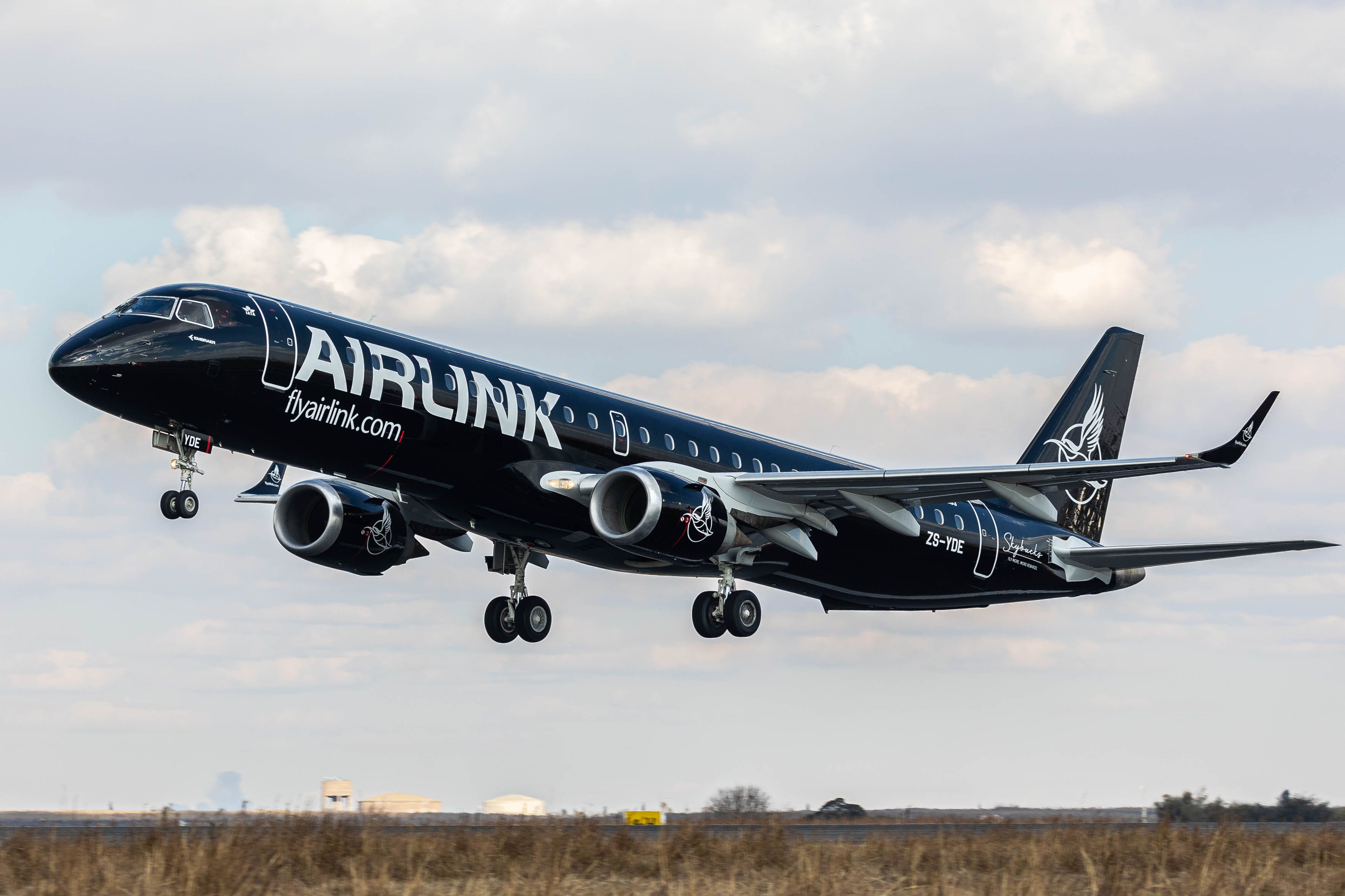 Airlink E190 with new black Skybucks livery