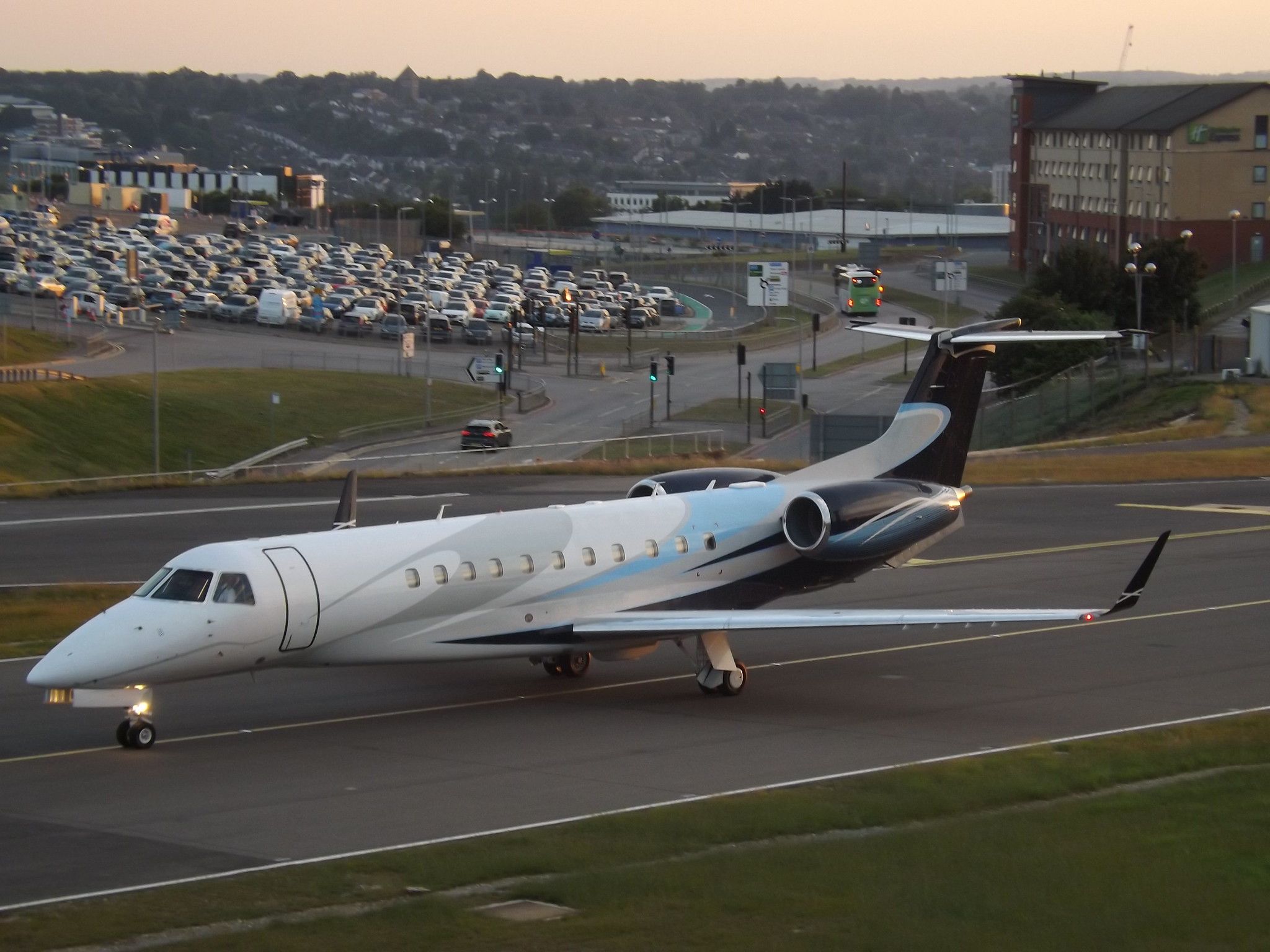 An Embraer Legacy 600 taxiing to the runway.