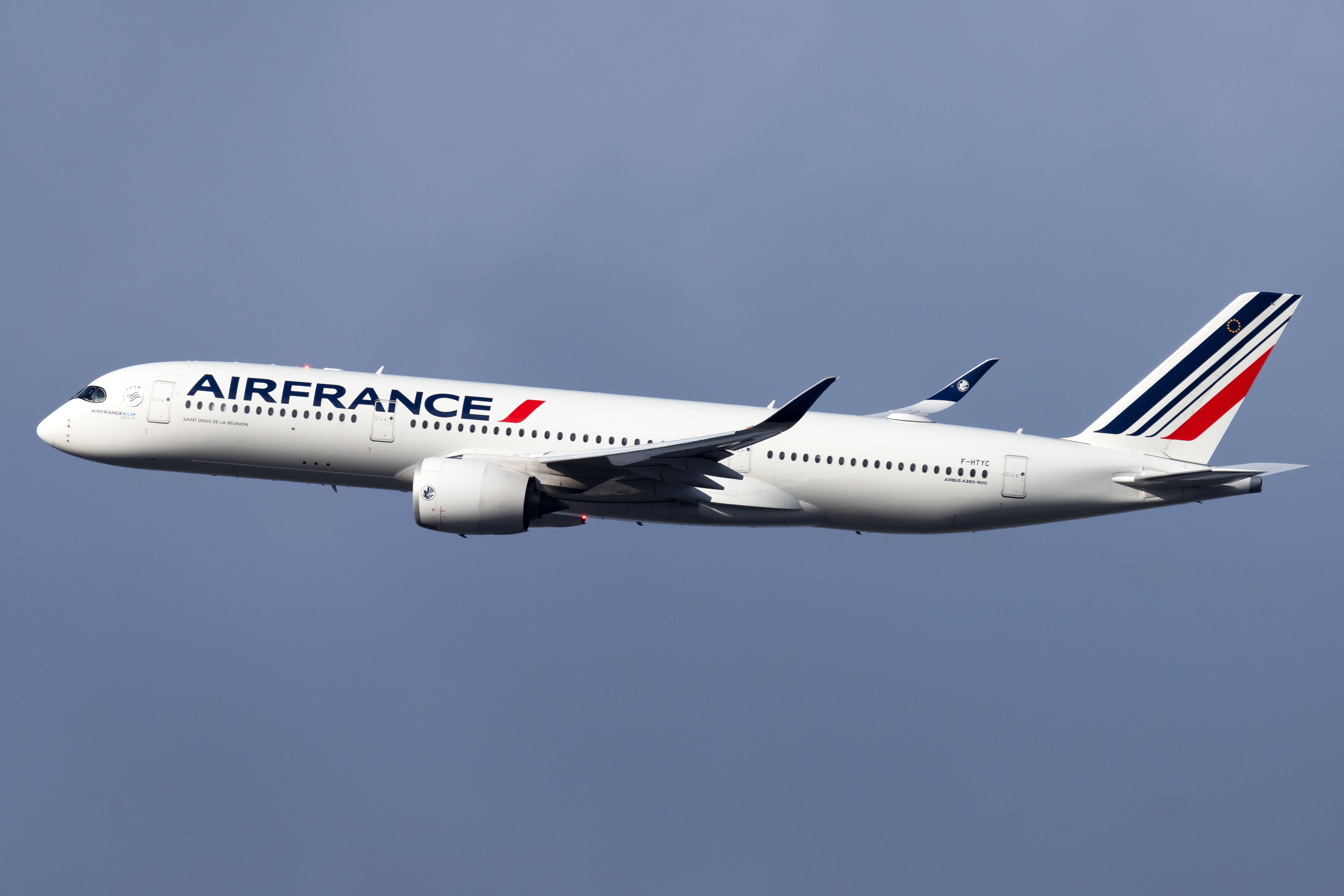 An Air France A350 flying in the sky.