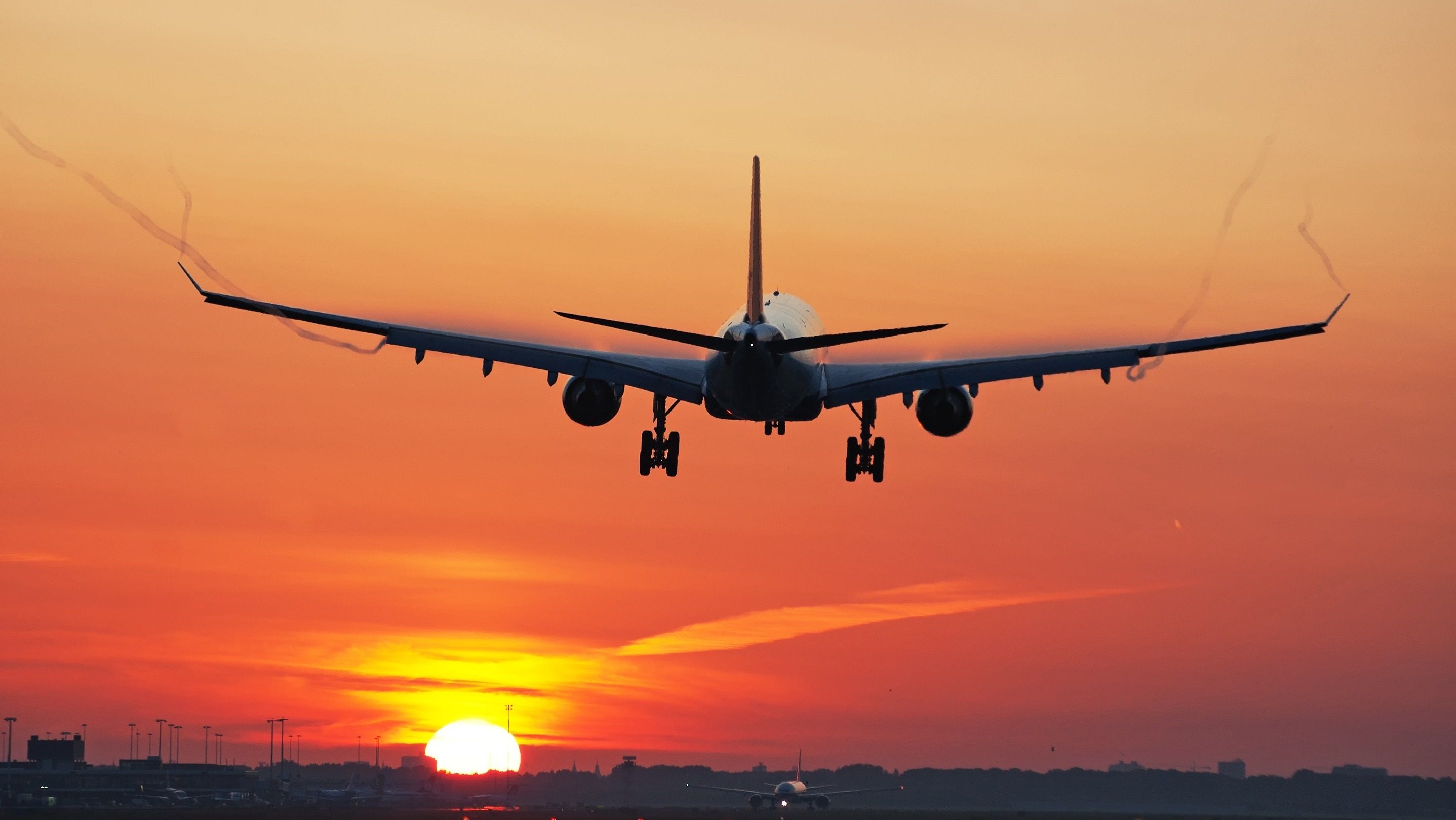 Airbus A330 landing sunrise