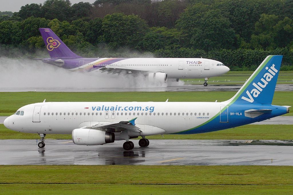 A Valuair Airbus A320 taxiing to the runway.