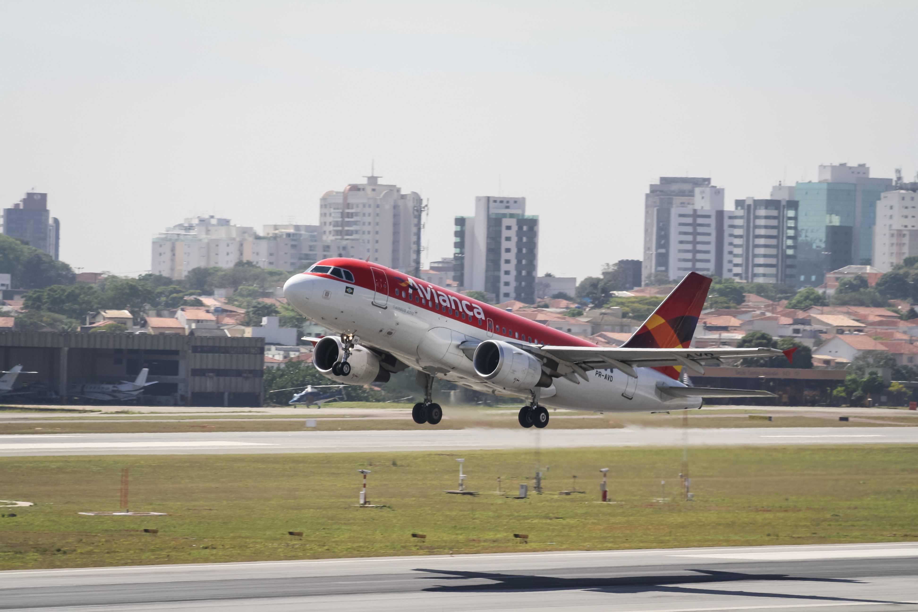 An Avianca Brasil Airbus A319 taking off from Congonhas Airport.