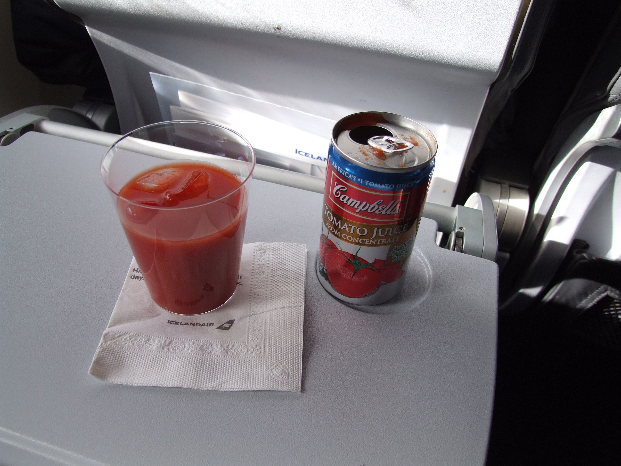 Campbell's_tomato_juice_on_a_flight_of_Icelandair