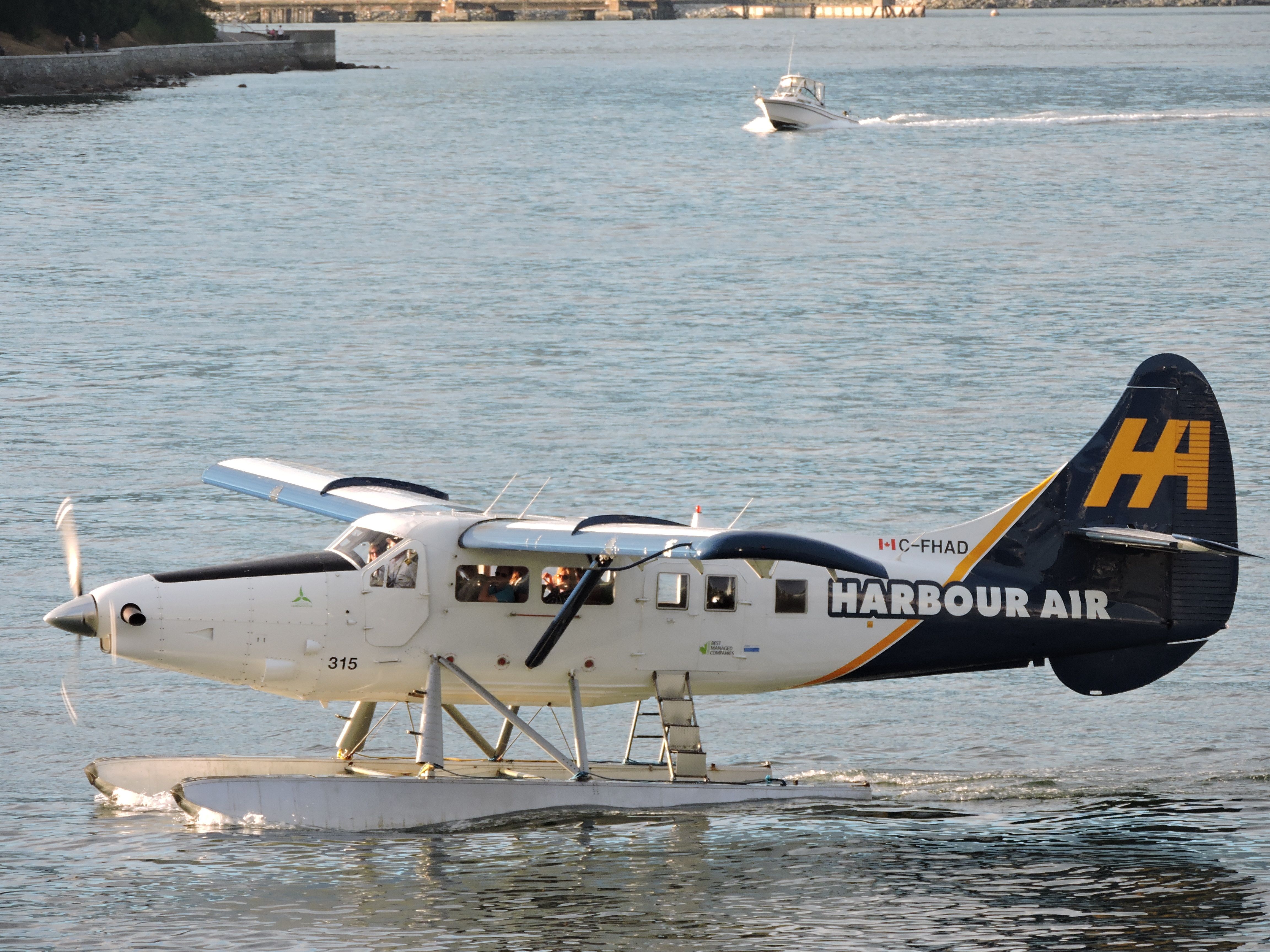 A Harbour Air DHC-3 Otter parked on water.