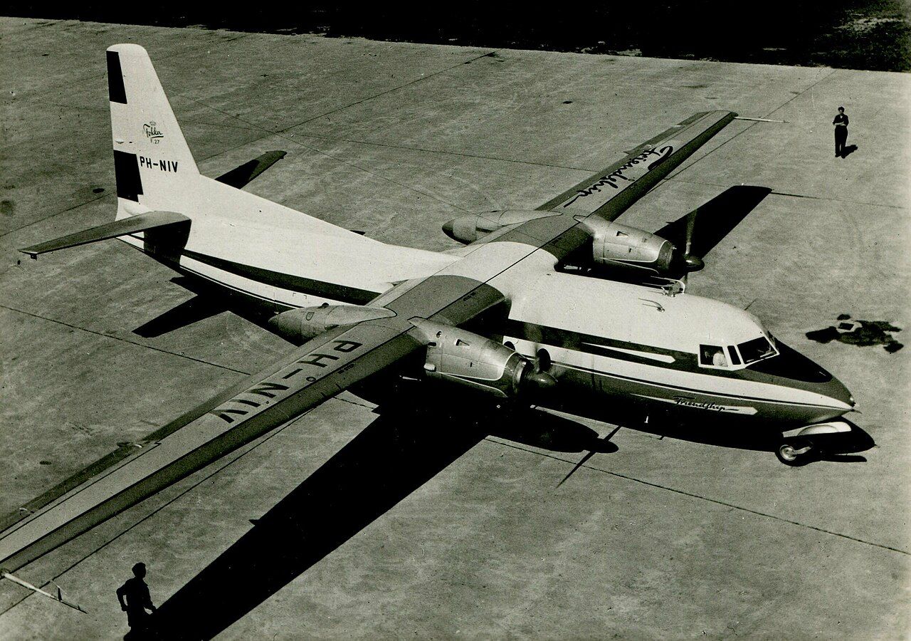 A Fokker F27 parked at an airfield.