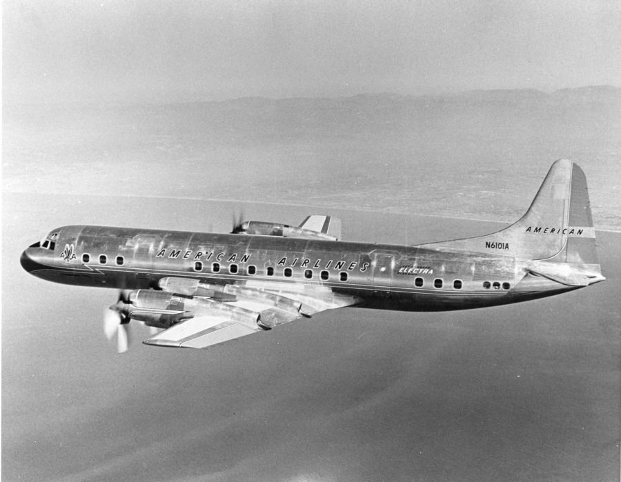 An American Airlines Lockheed L-188 Electra flying in the sky.