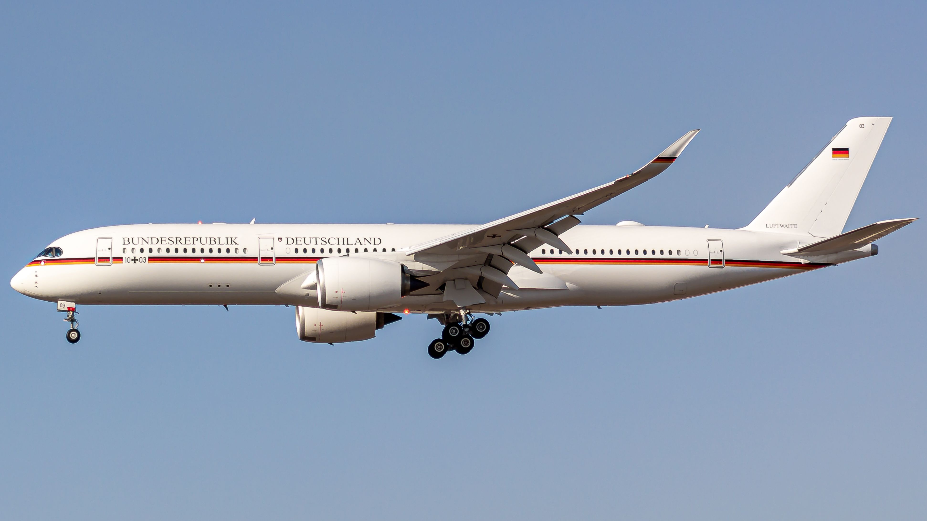 A German Air Force Airbus ACJ350-900 flying in the sky.