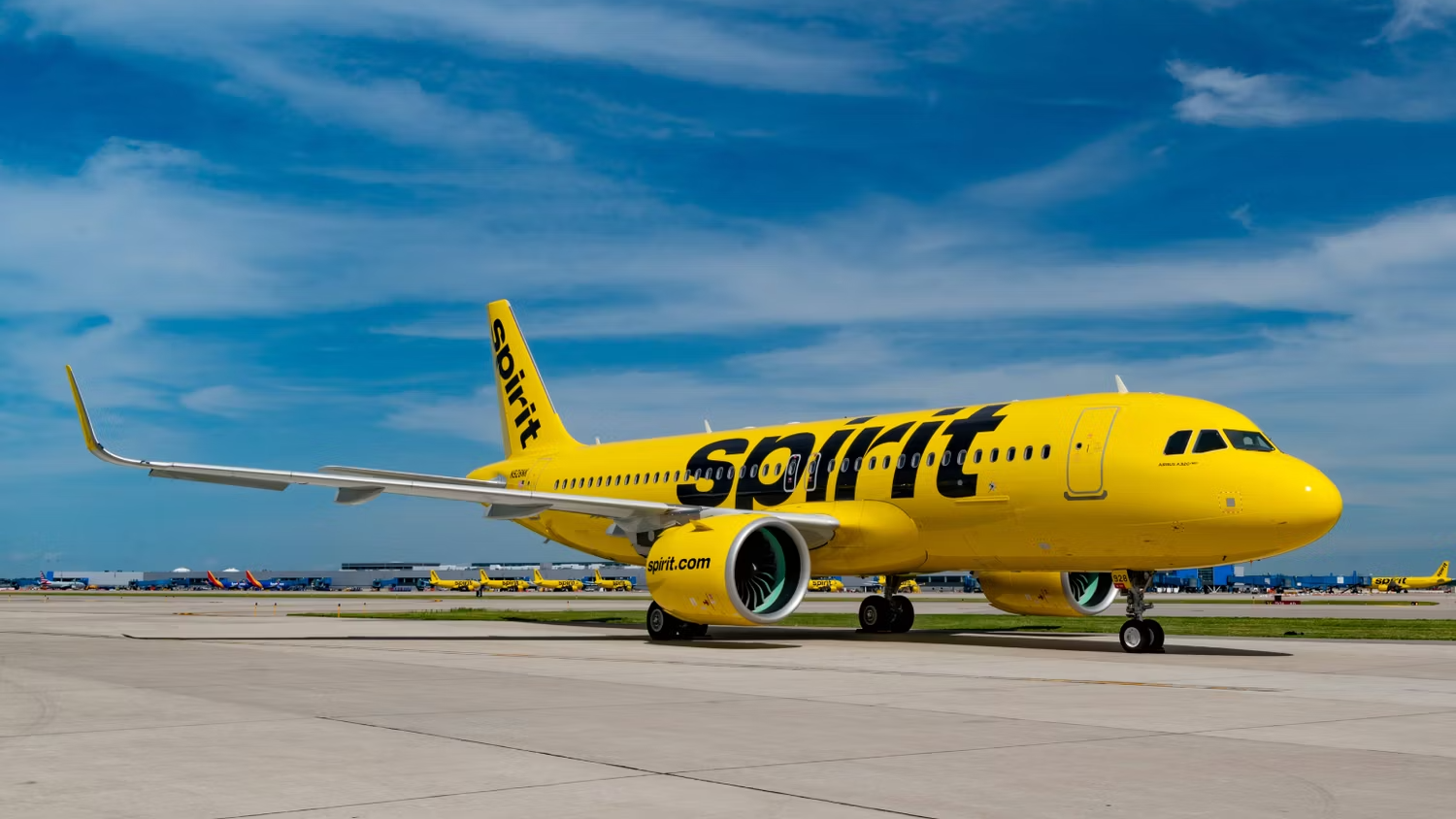 A Spirit Airlines Airbus A320neo Taxiing At An Airport.
