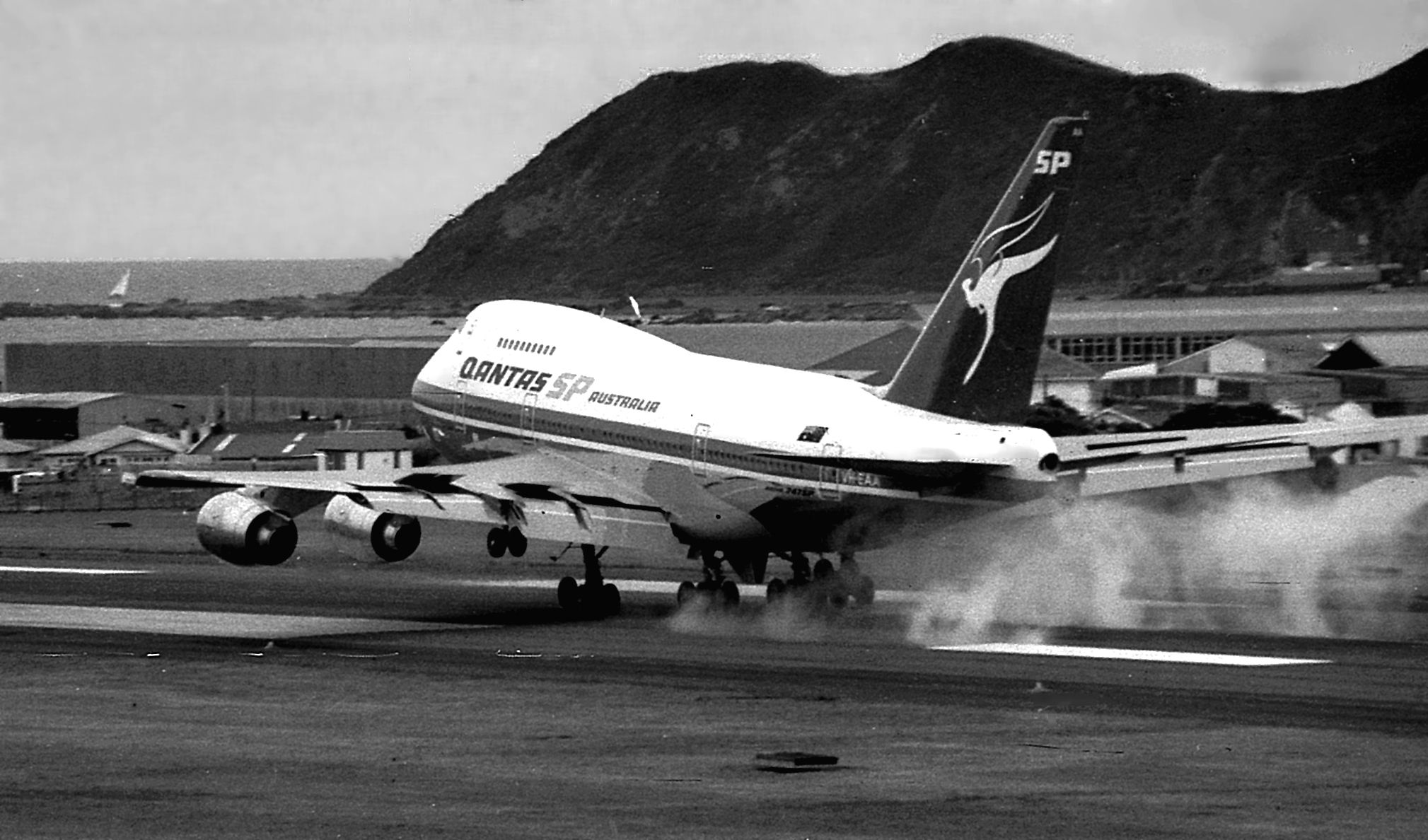 A Qantas Boeing 747SP just after landing on a runway.