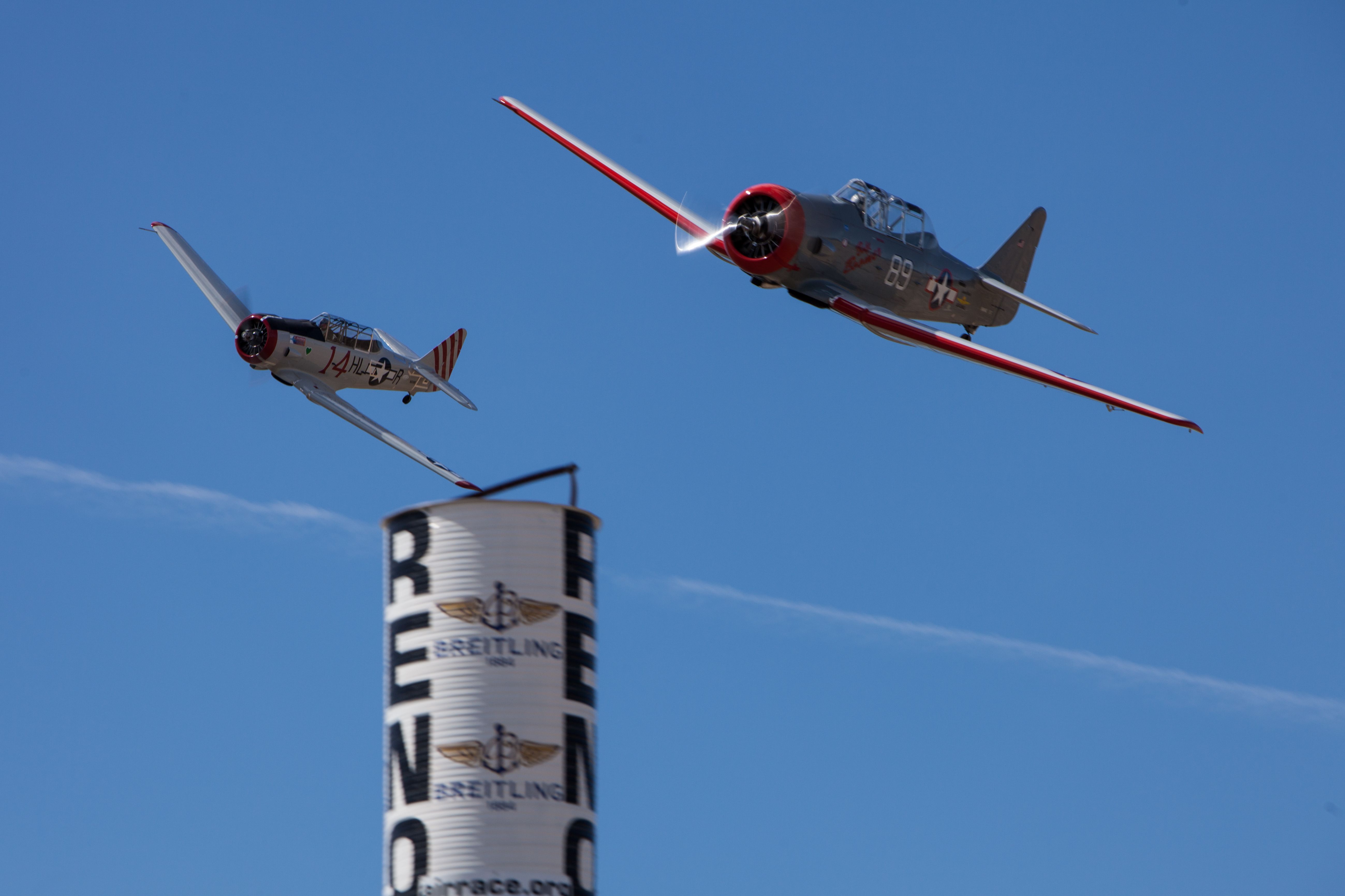 Multiple aircraft flying during the Reno Air Race.