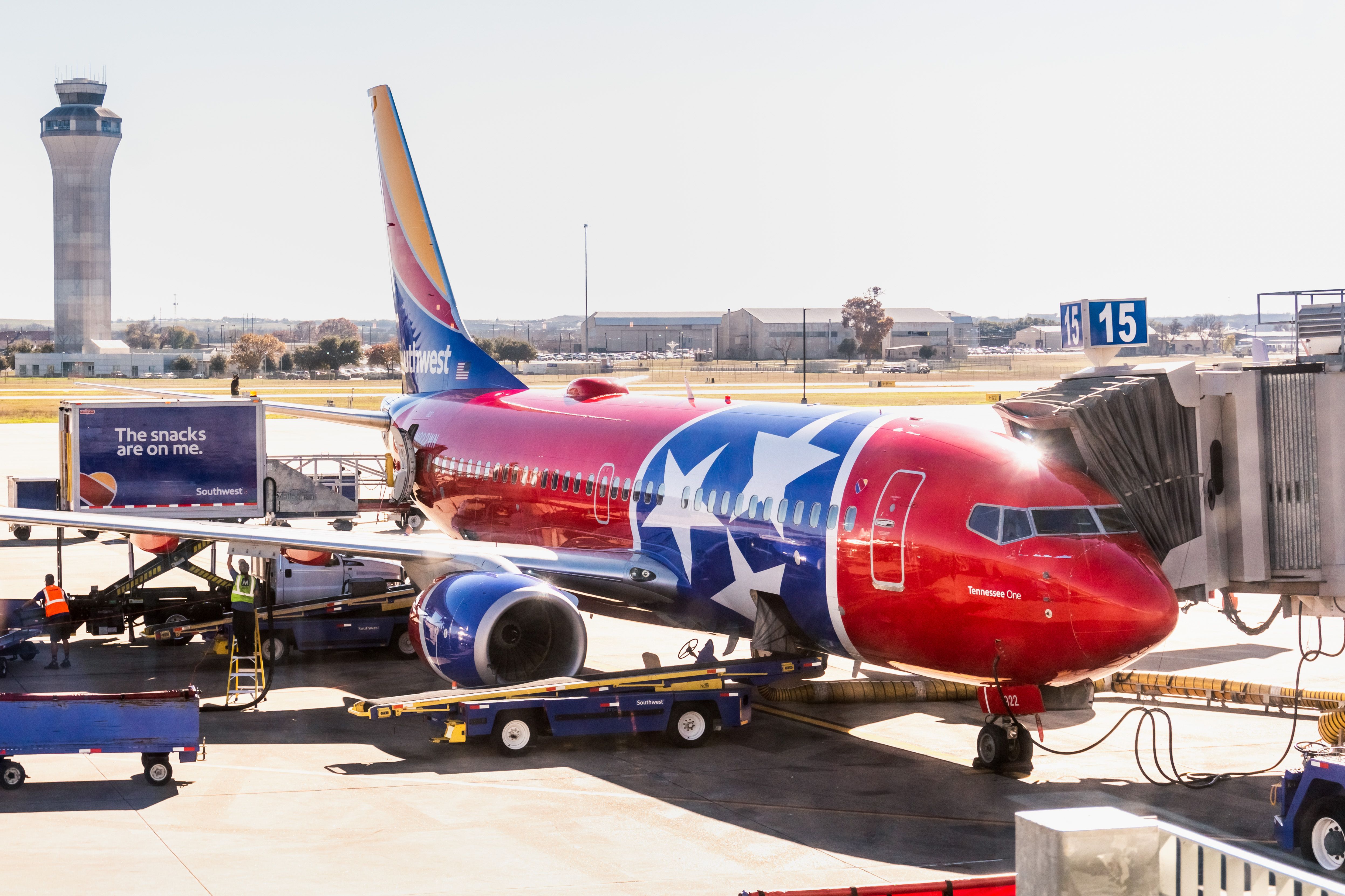 Tennessee One Southwest Airlines aircraft (livery honoring and modeled after the Tennessee state flag) docked at Austin-Bergstrom International Airport