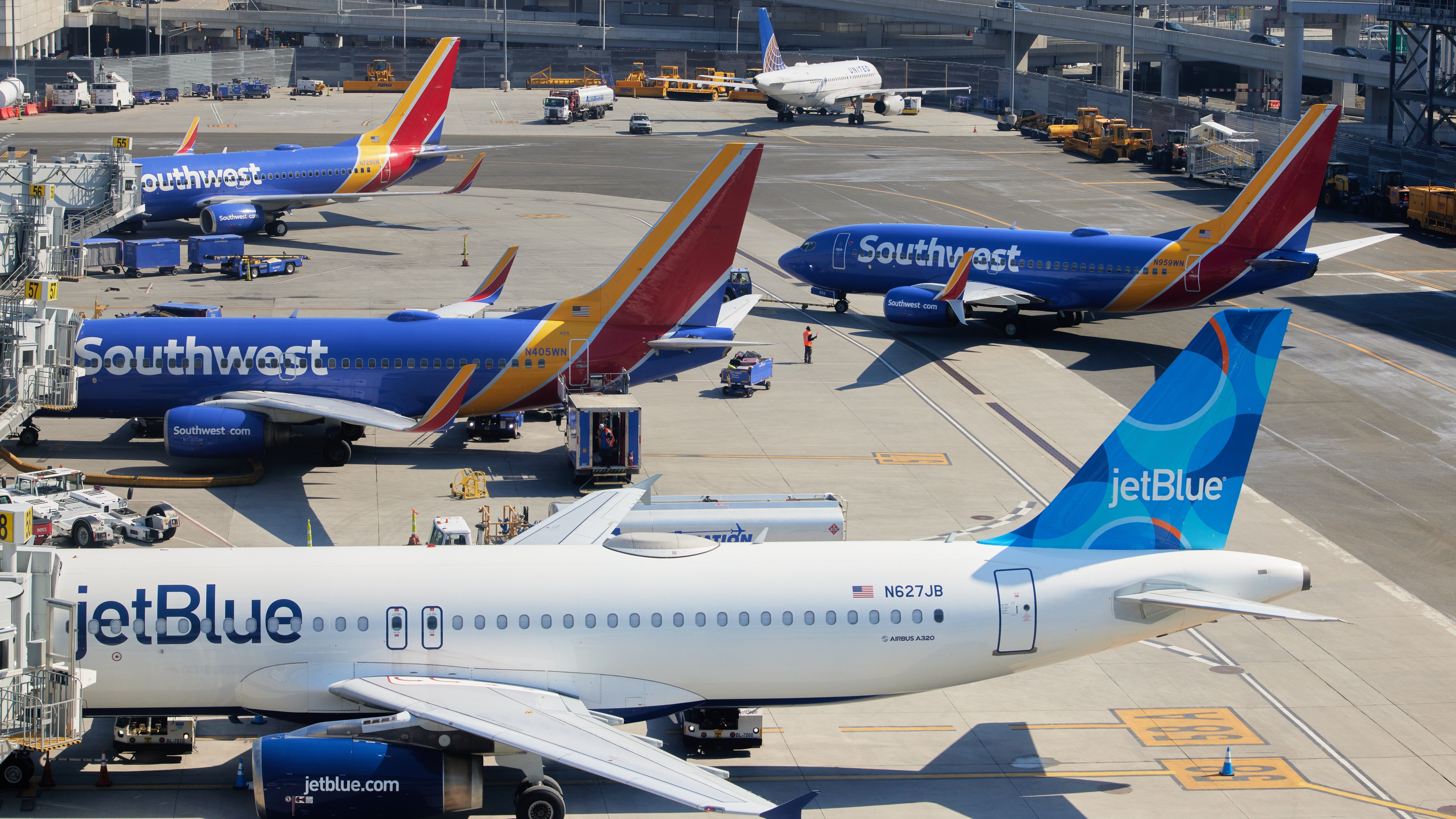 Multiple Southwest and JetBlue Planes At LaGuardia Airport.