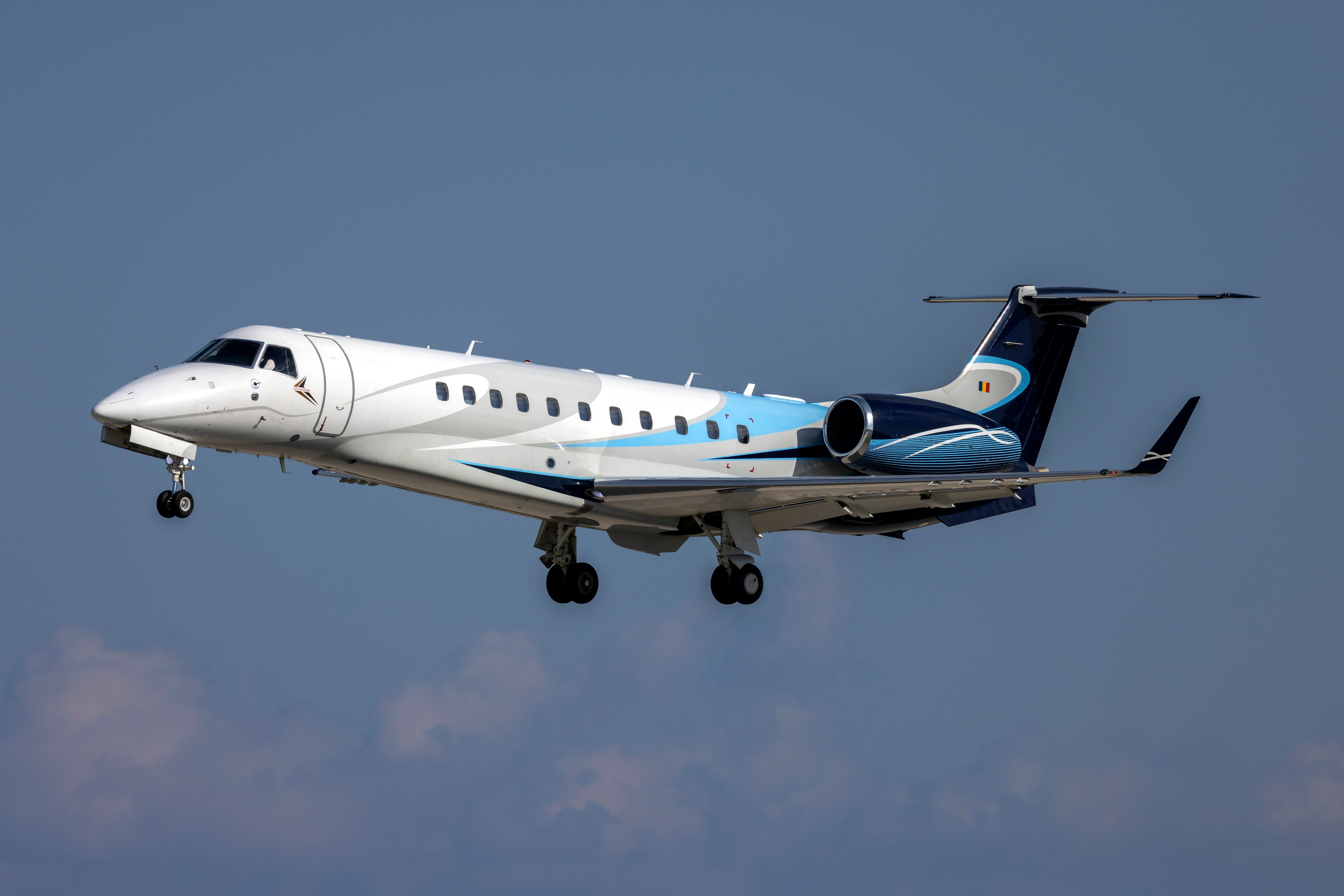 An Embraer Legacy 600 flying in the sky.