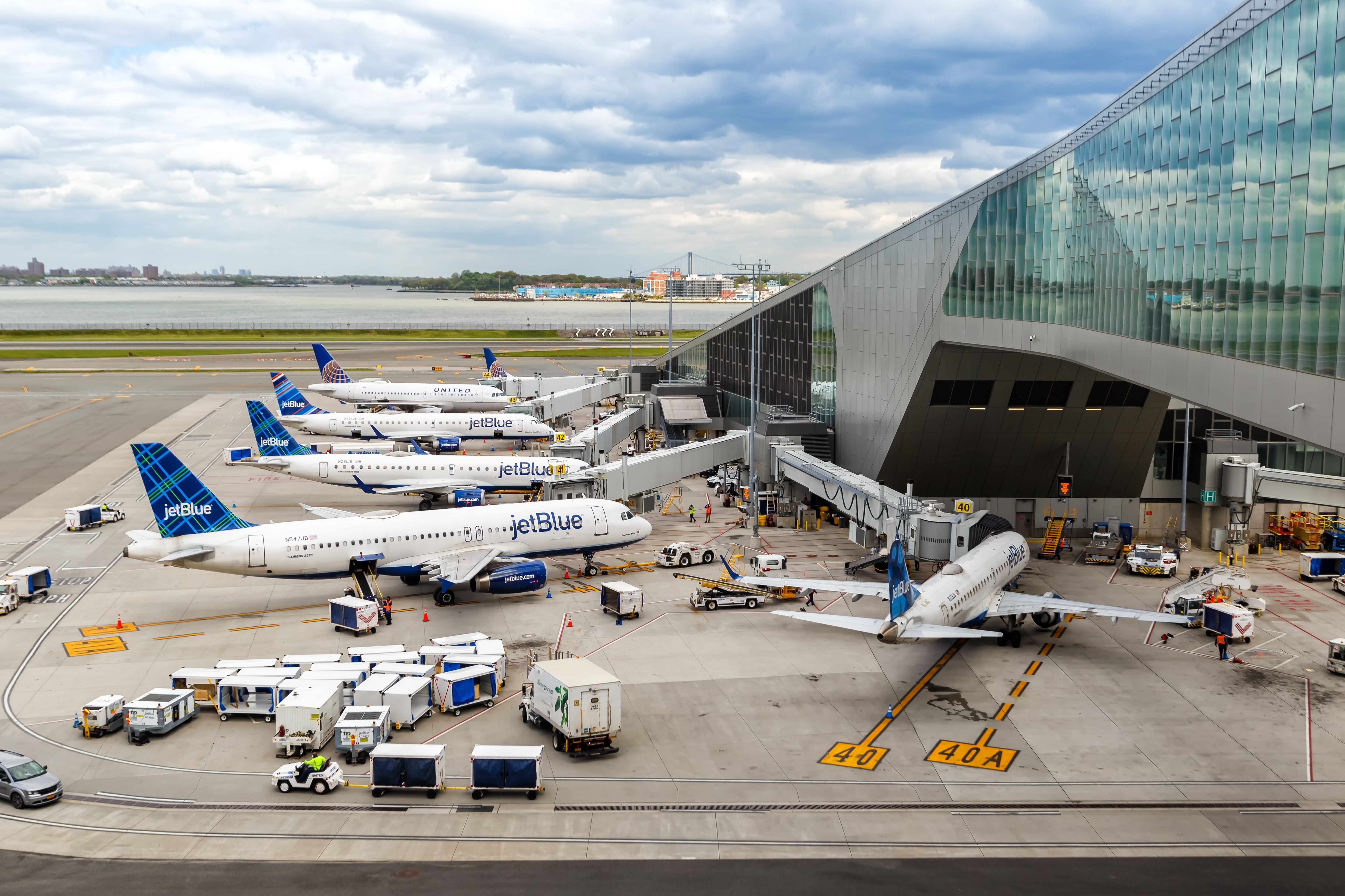Many JetBlue Planes Parked At New York LaGuardia Airport.