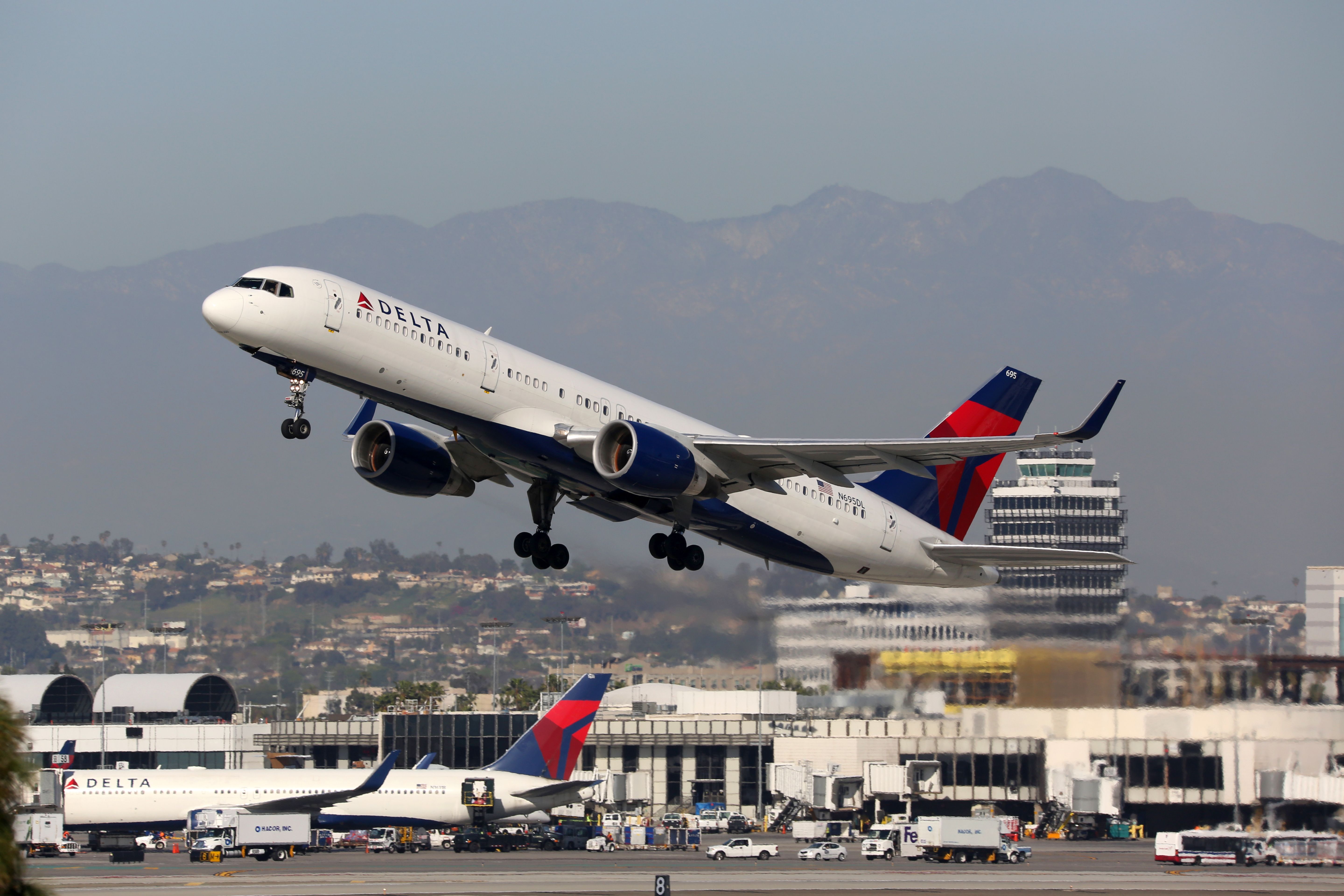 A Delta Air Lines Boeing 757-200 taking off.