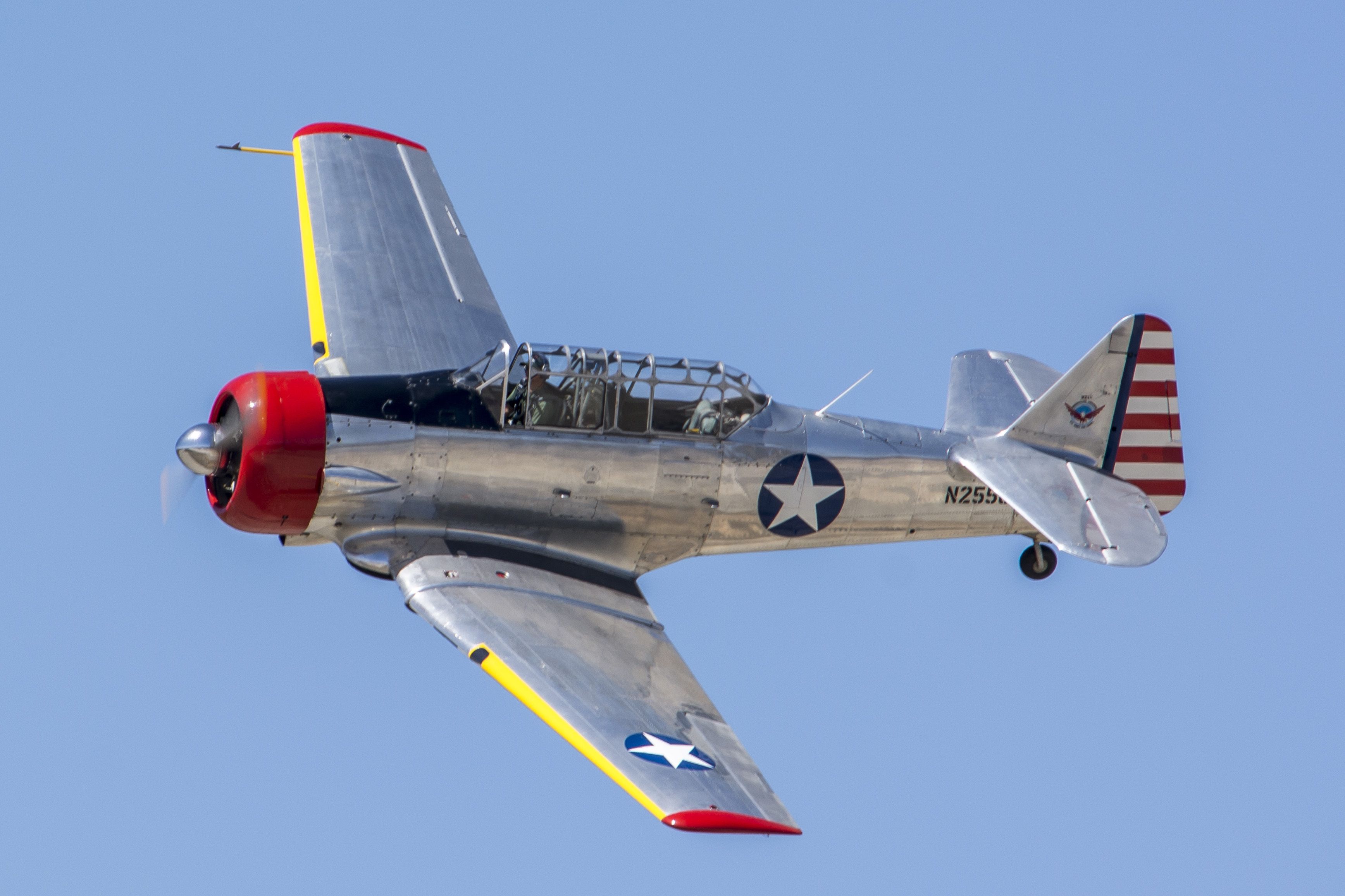 A North American T-6 Texan flying in the sky.