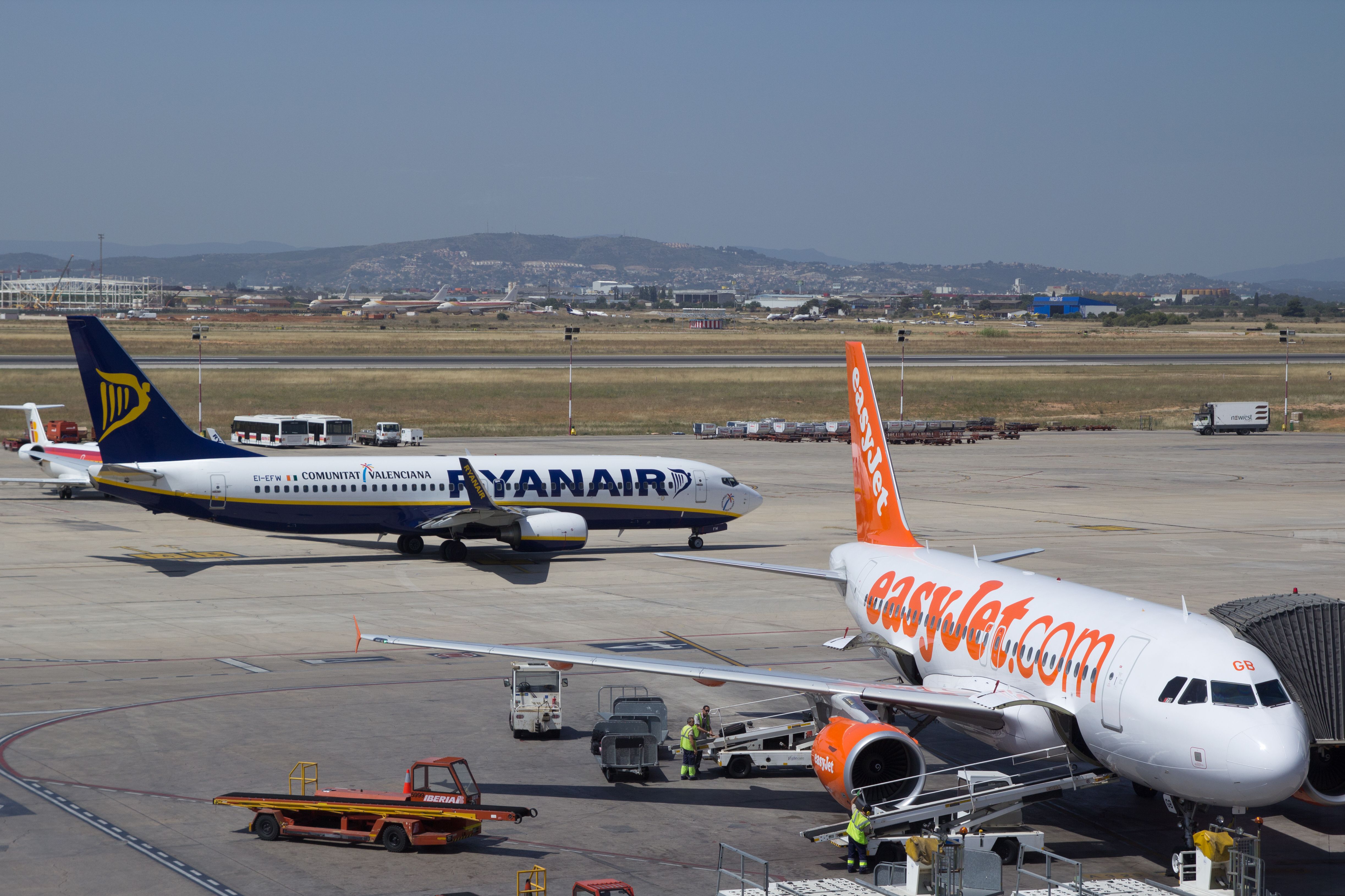 Ryanair and easyJet planes at an airport.