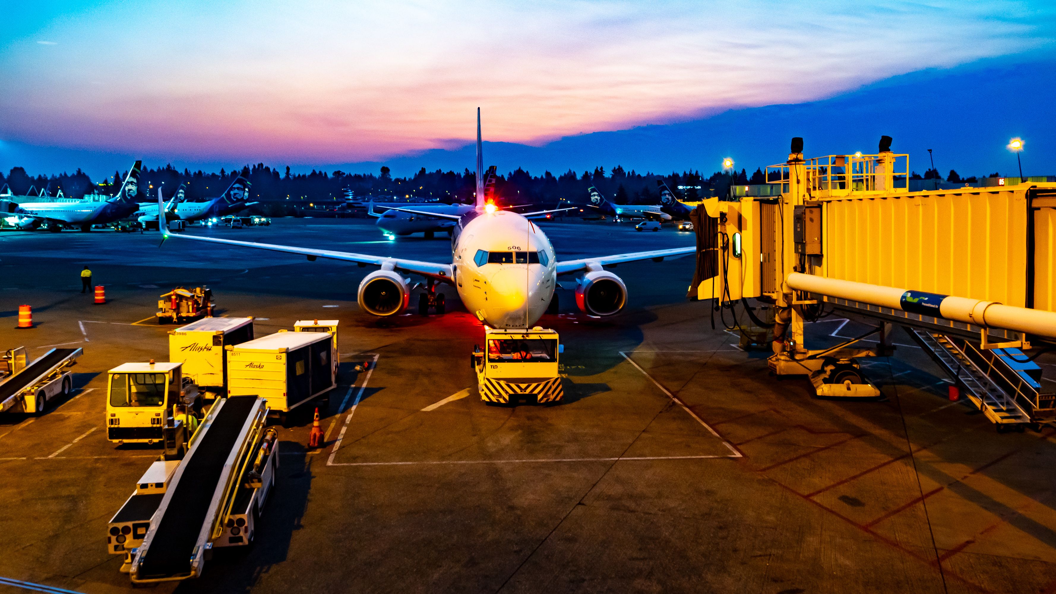 Sunrise at Busy KSEA With Alaska Airlines 737-800 Pulling Back