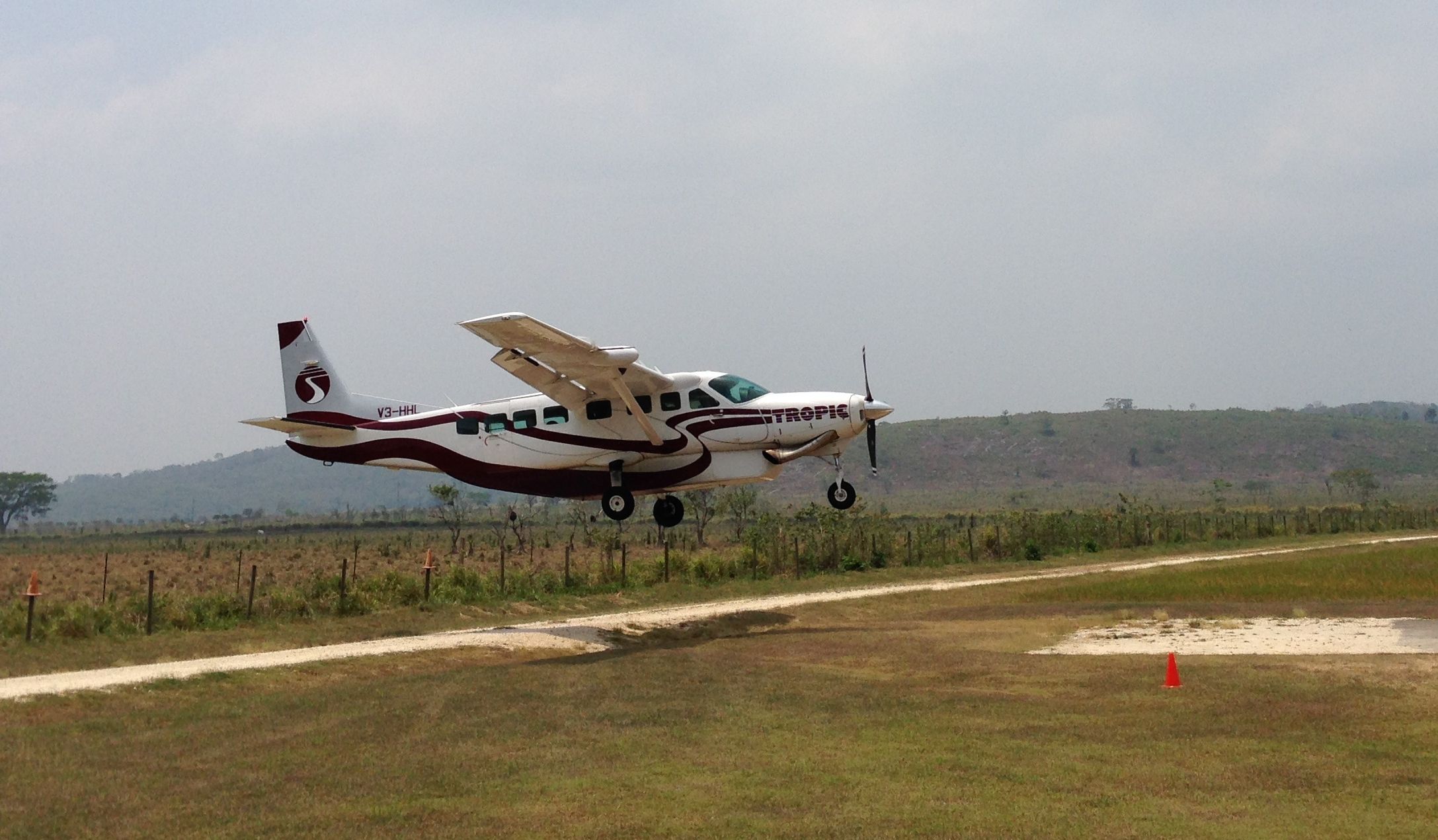 A Tropic Air Cessna 208 about to land.