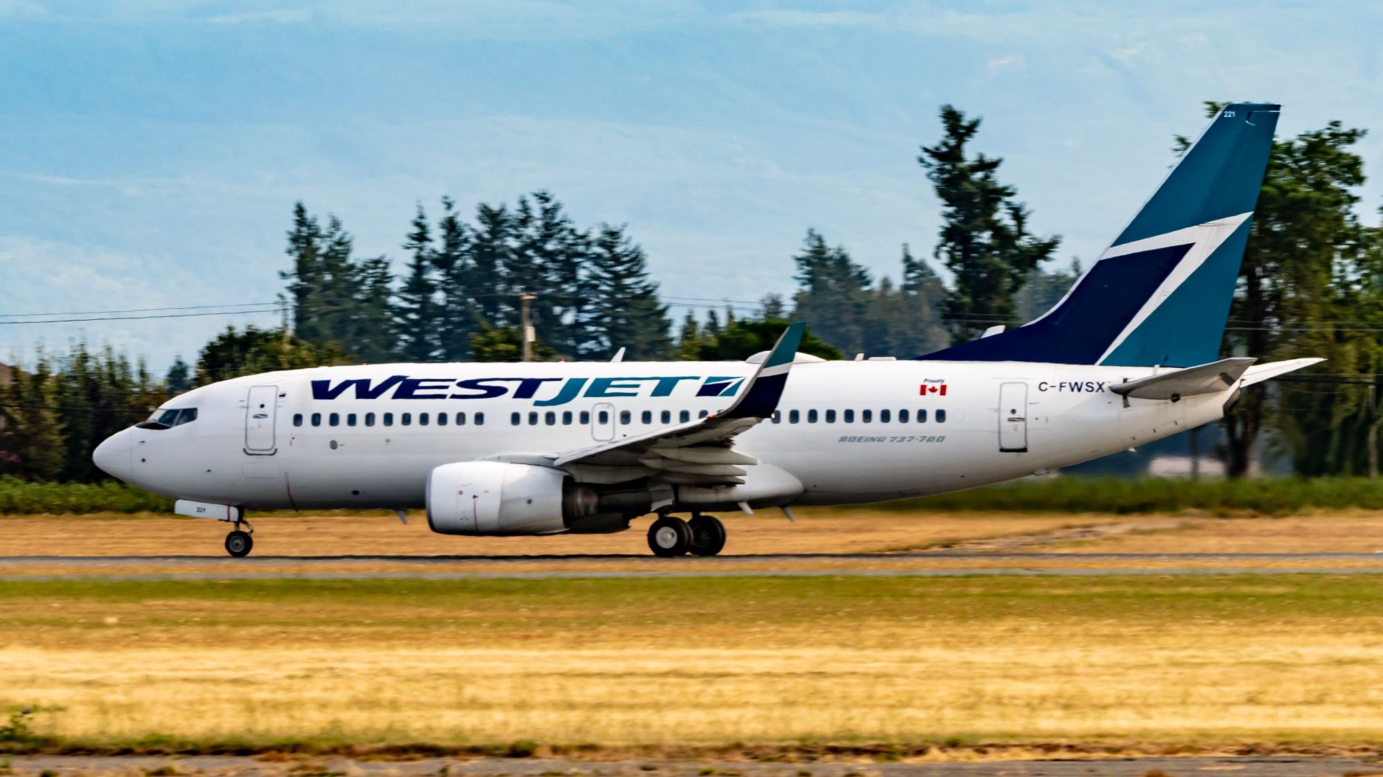 A WestJet Boeing 737-700 on the ground.