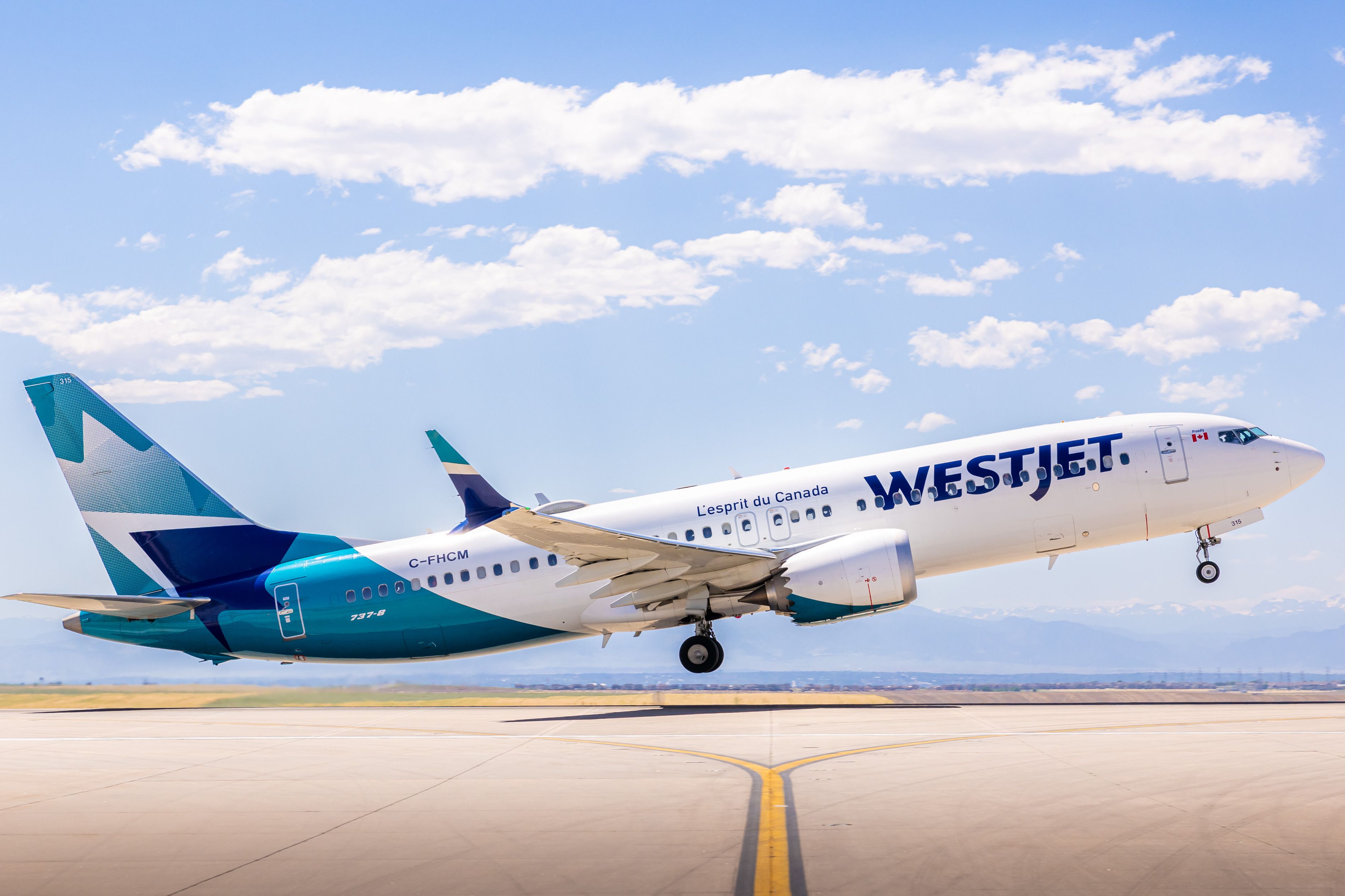 A WestJet Boeing 737-8 taking off.