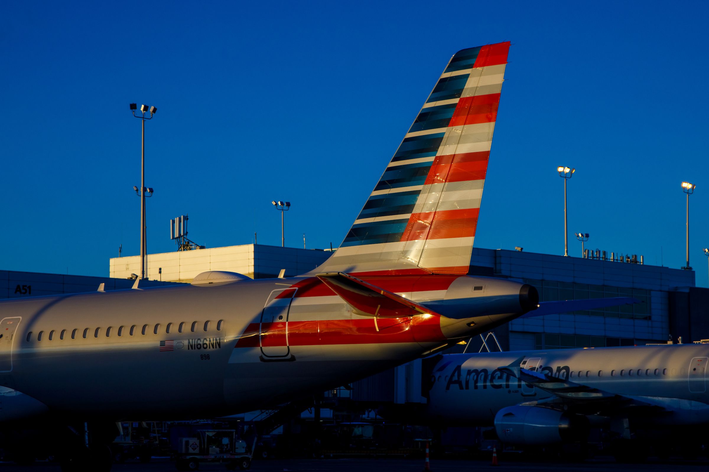 123120_airfield_airlines_american-037 - Two American Airlines jets in the blue hour at Denver International Airport