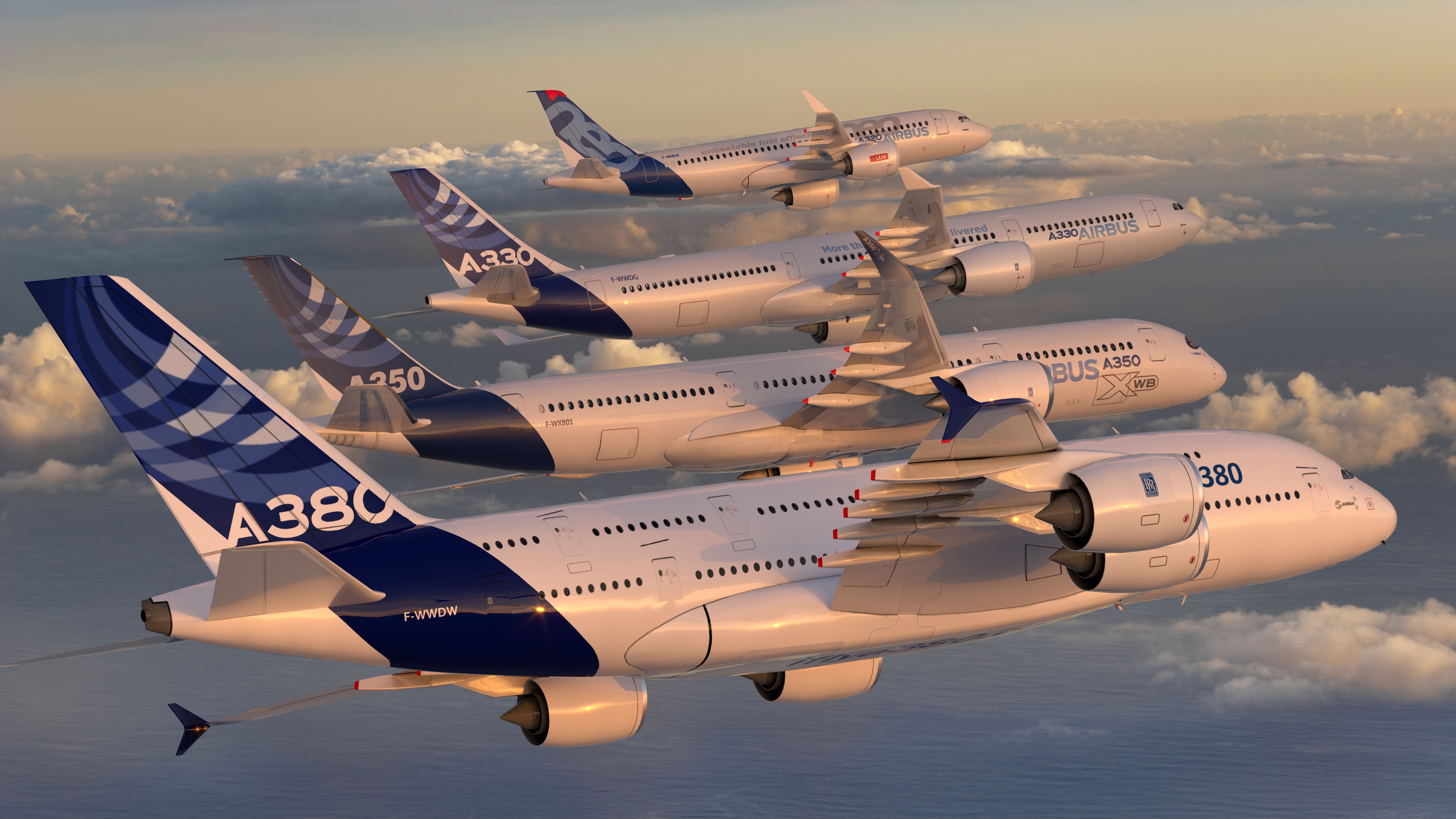An Airbus A380, A350, A330, and A320 flying together