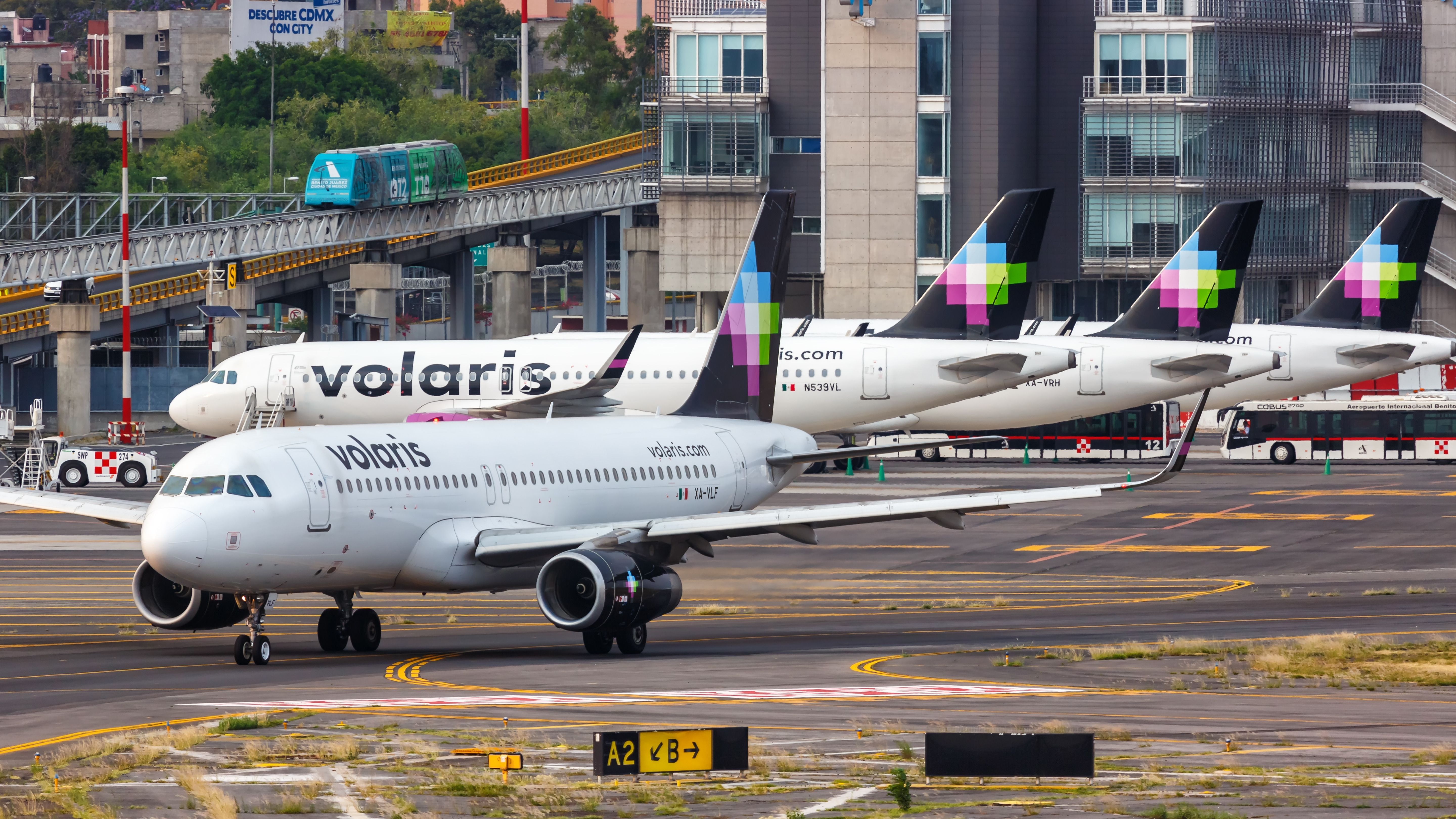 Several Volaris aircraft at MEX