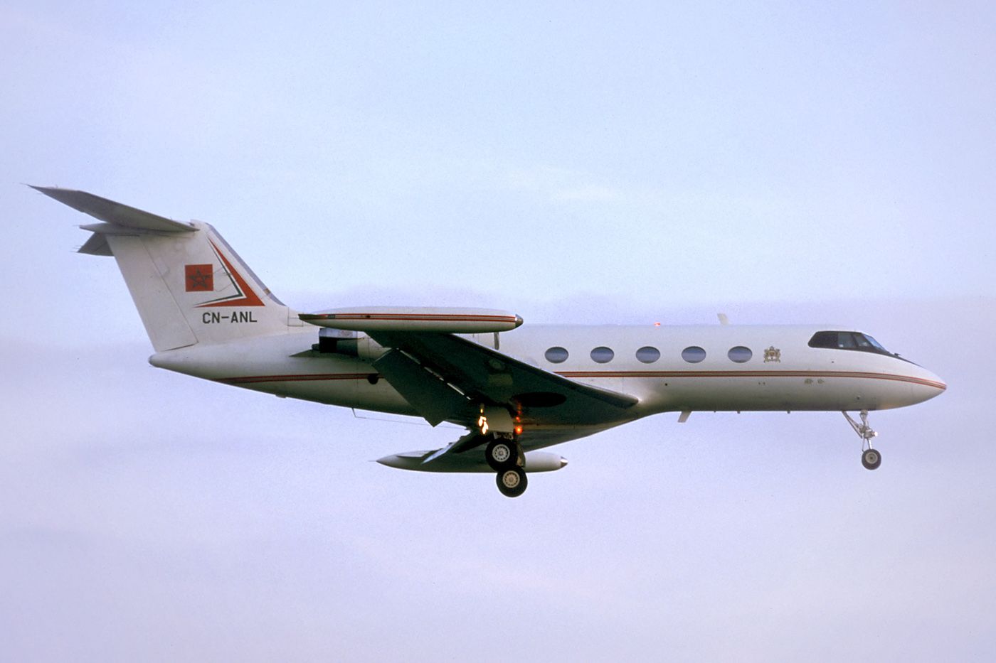 A Gulfstream II flying in the sky.