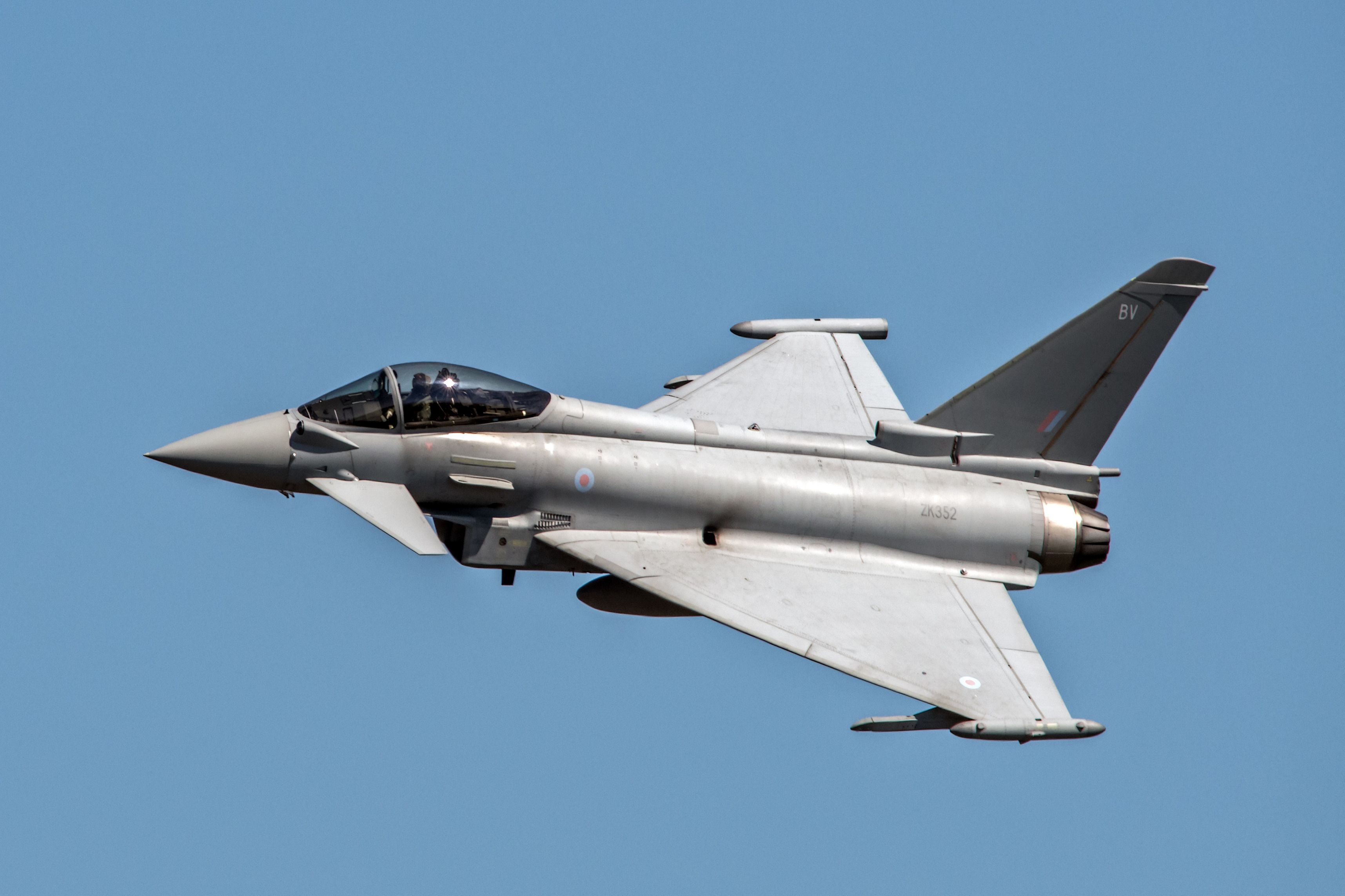 A Eurofighter Typhoon flying in the sky.