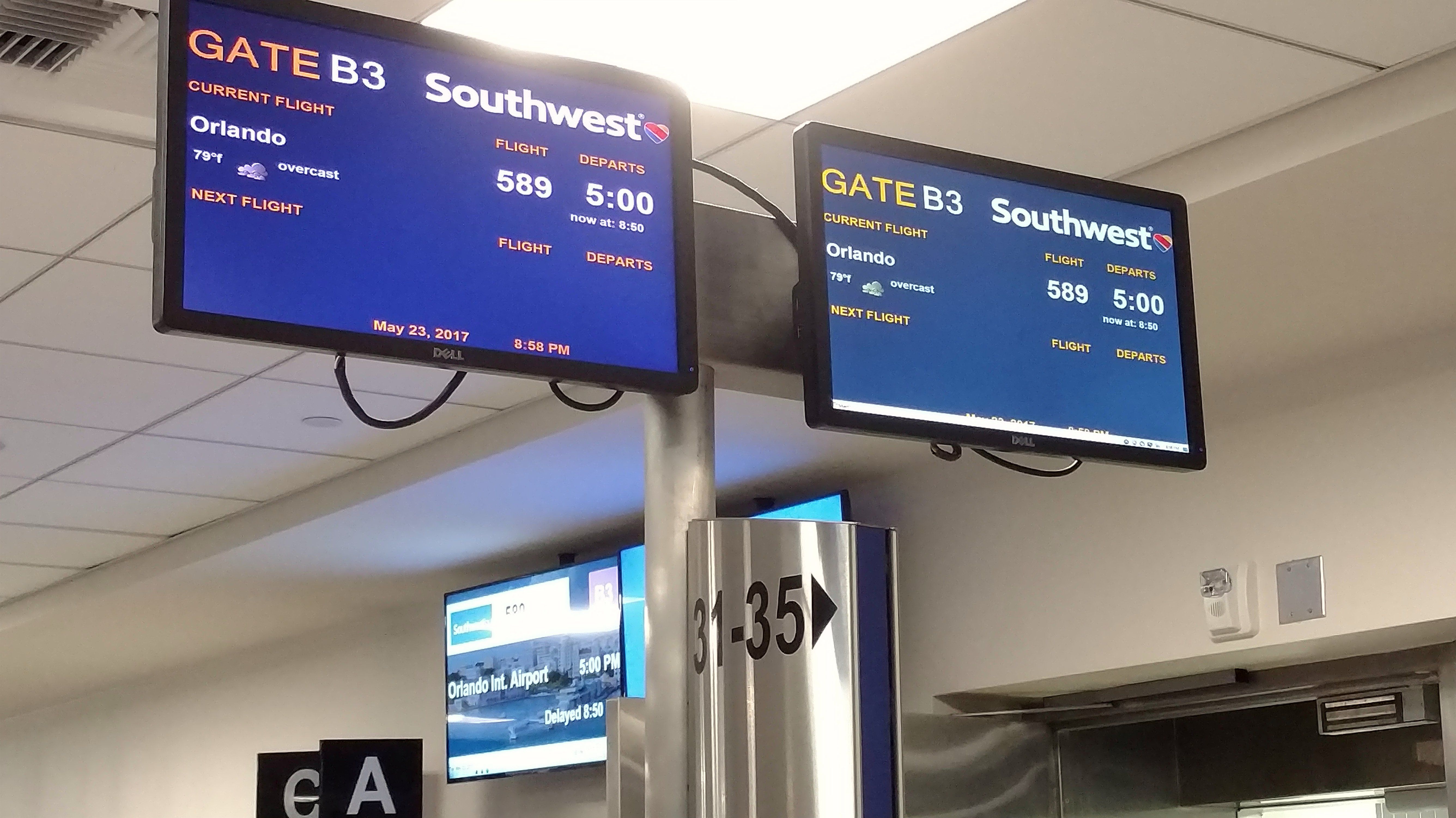 The screens at the Boarding Gate for a Southwest flight.